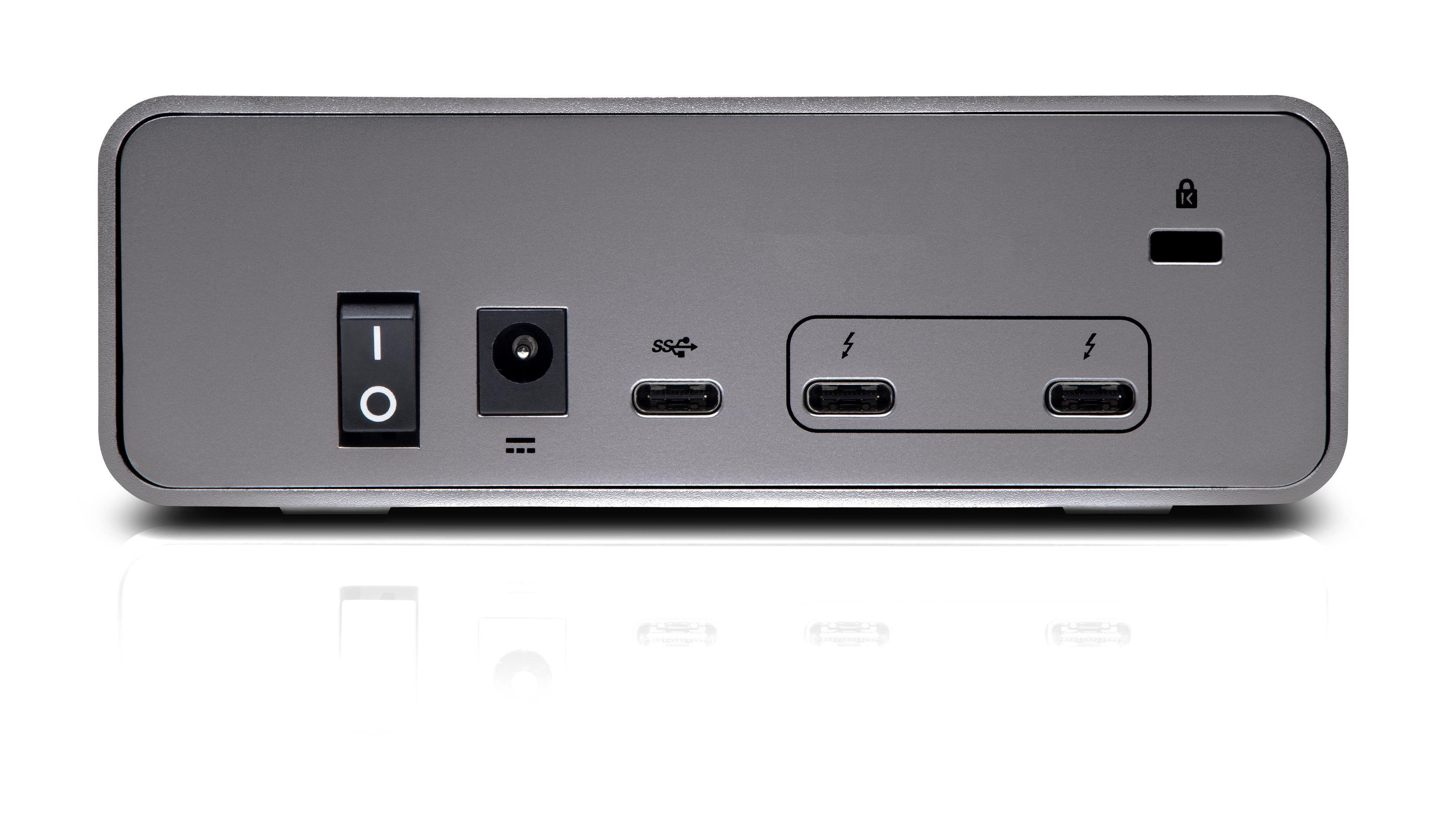 Srebrny zewnętrzny dysk twardy z włącznikiem, portem zasilania, USB-C i portami Thunderbolt.