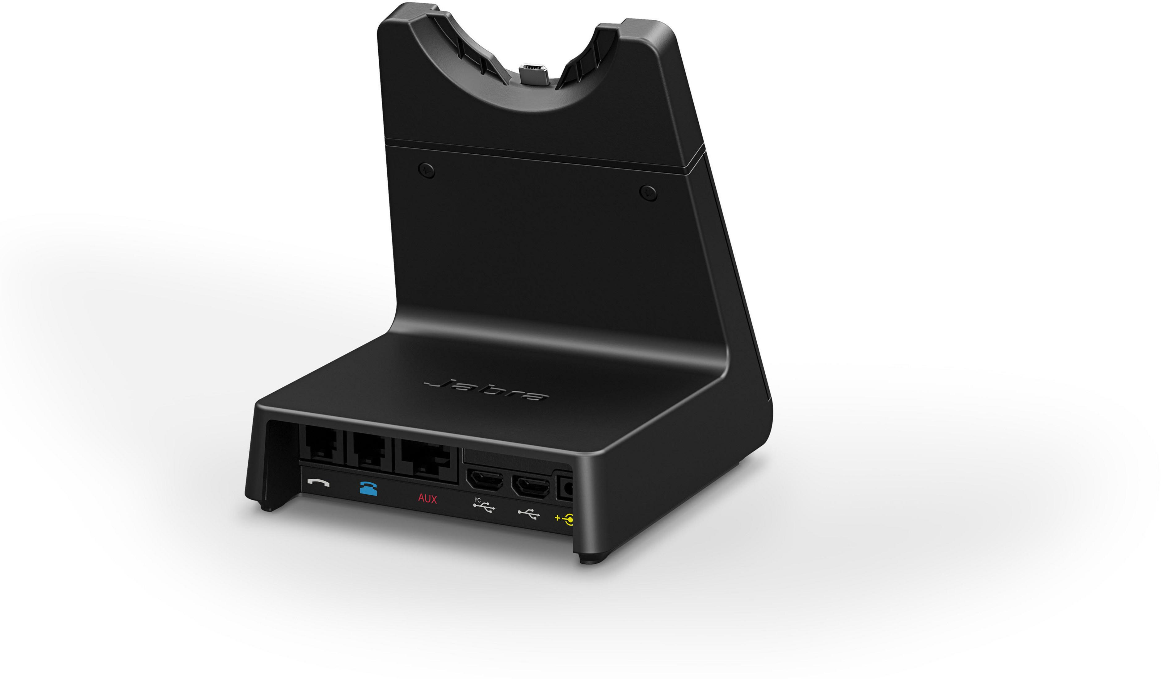 Czarna stacja dokująca z różnymi portami, w tym AUX, HDMI i USB.