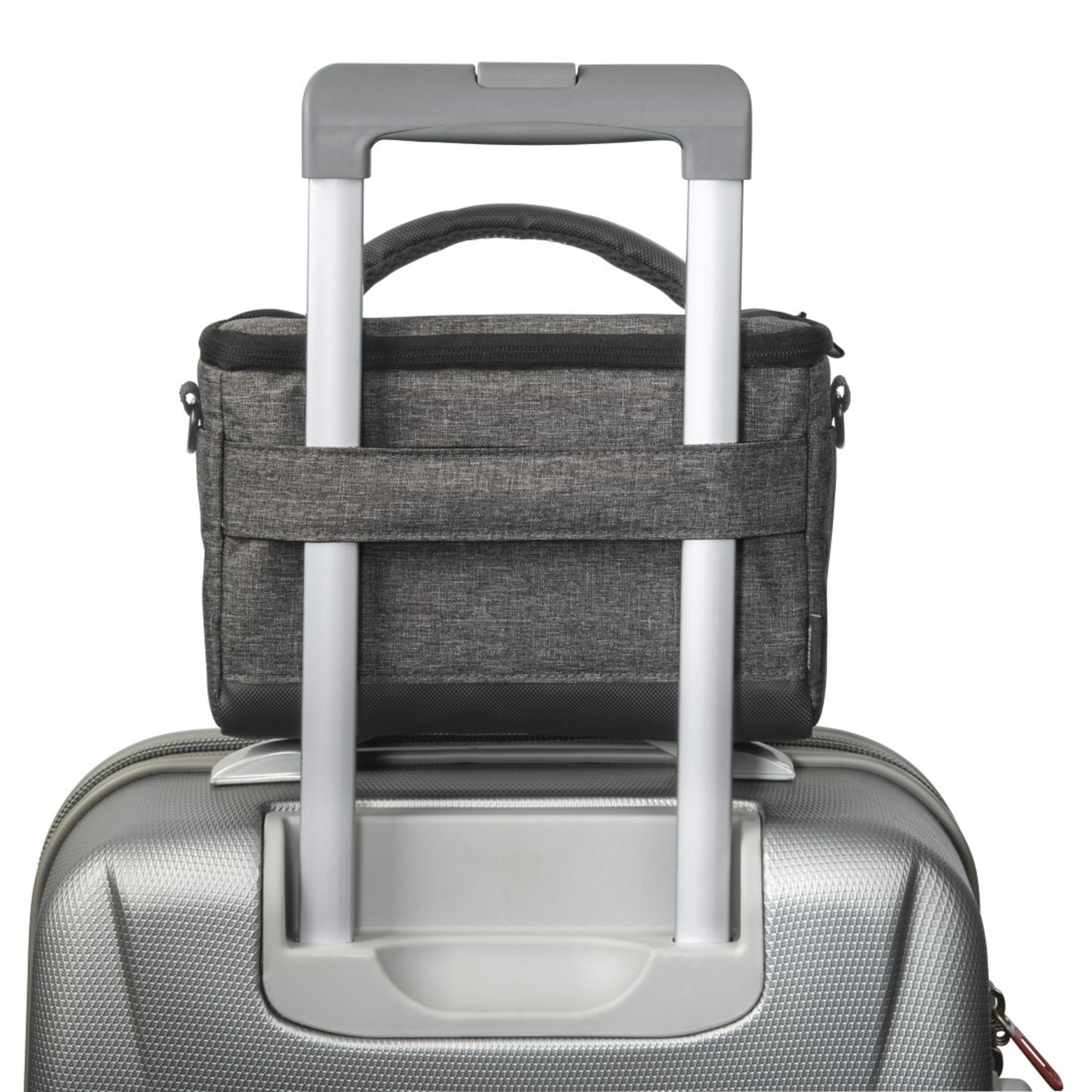 Torba podręczna na walizce z uchwytem.