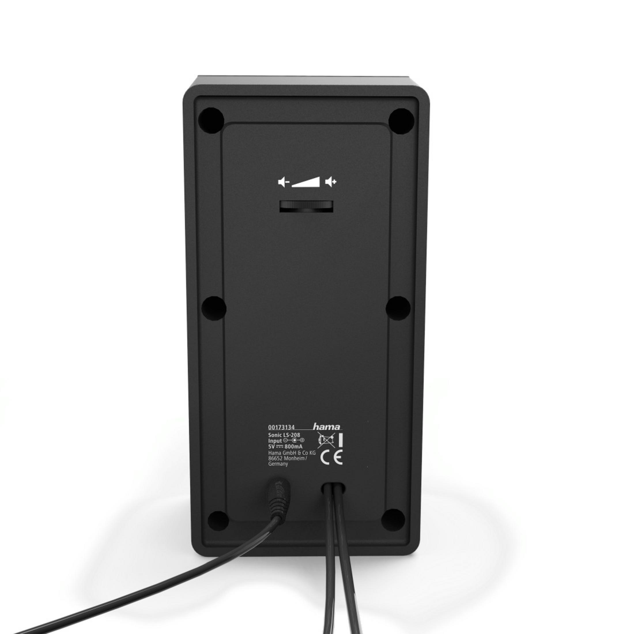 Tył czarnego głośnika. Ma przyciski i przewody. Białe tło.