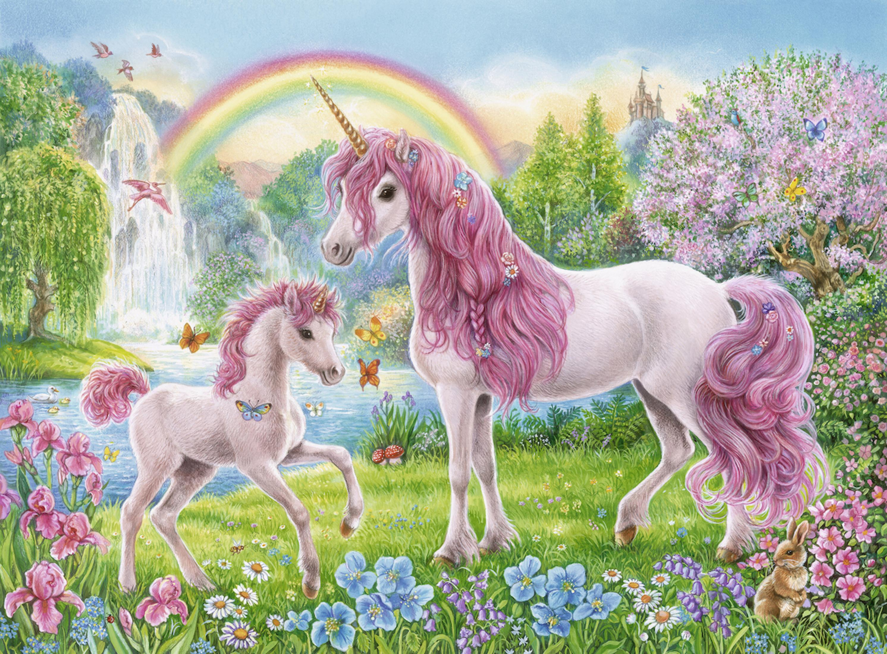 Due unicorni in un paesaggio colorato con arcobaleno e cascata.