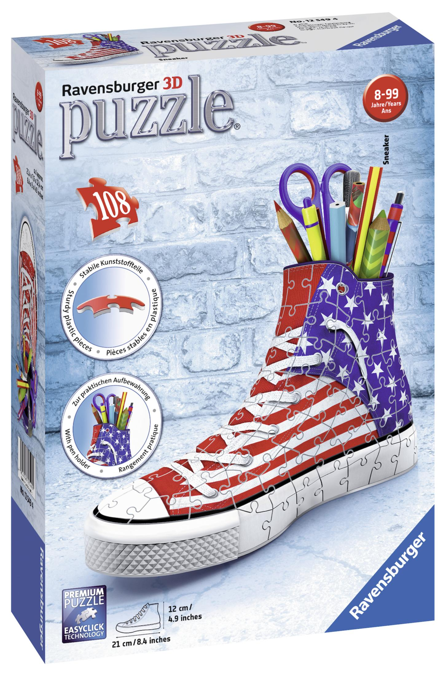 Scatola puzzle 3D Ravensburger a forma di sneaker, con matite all'interno.
