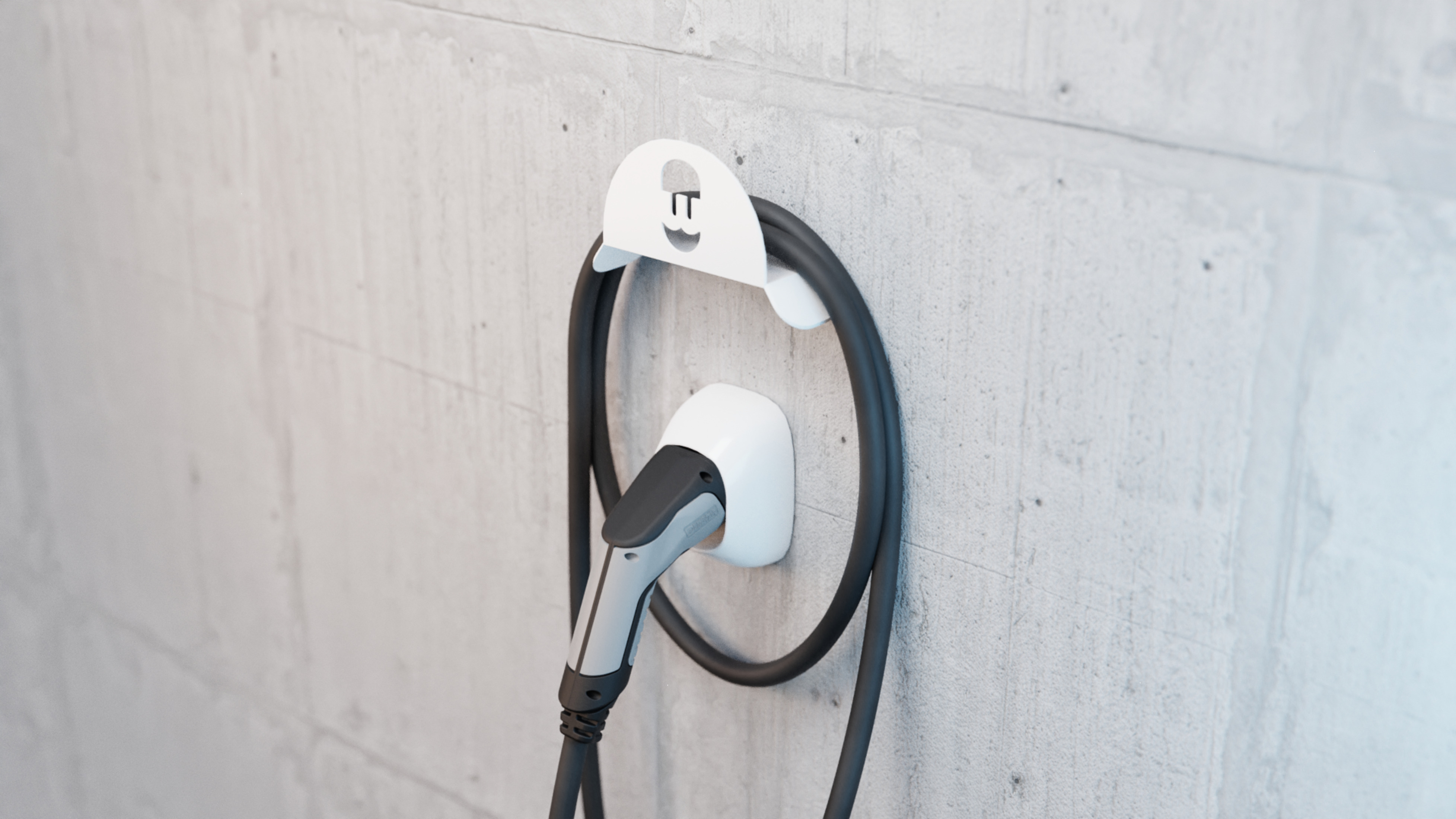 Ein Ladekabel für Elektrofahrzeuge, das in eine Wand gesteckt wird.