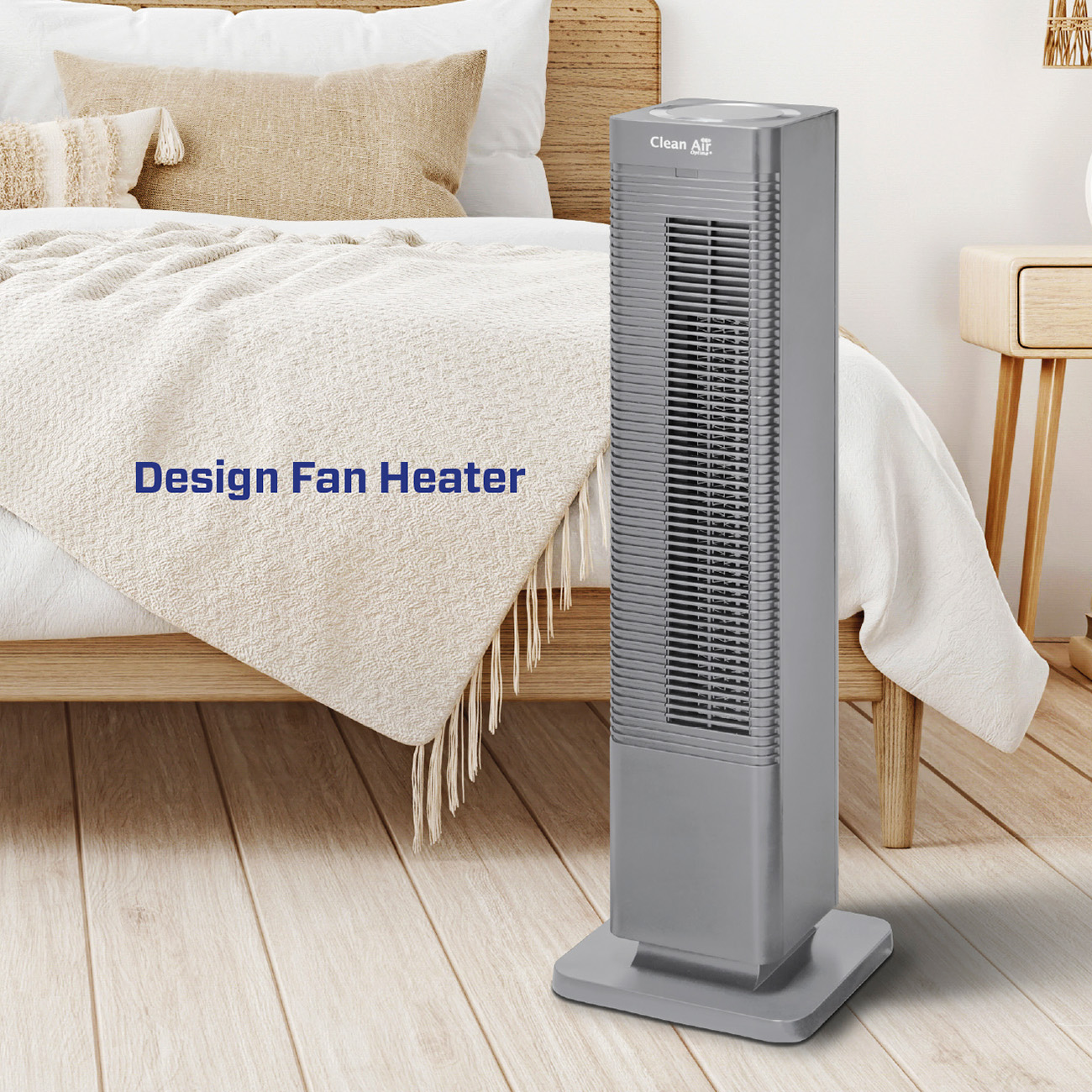 Grijze design ventilatorkachel in slaapkamer. Tekst: Design Fan Heater. Houten vloer en bed.