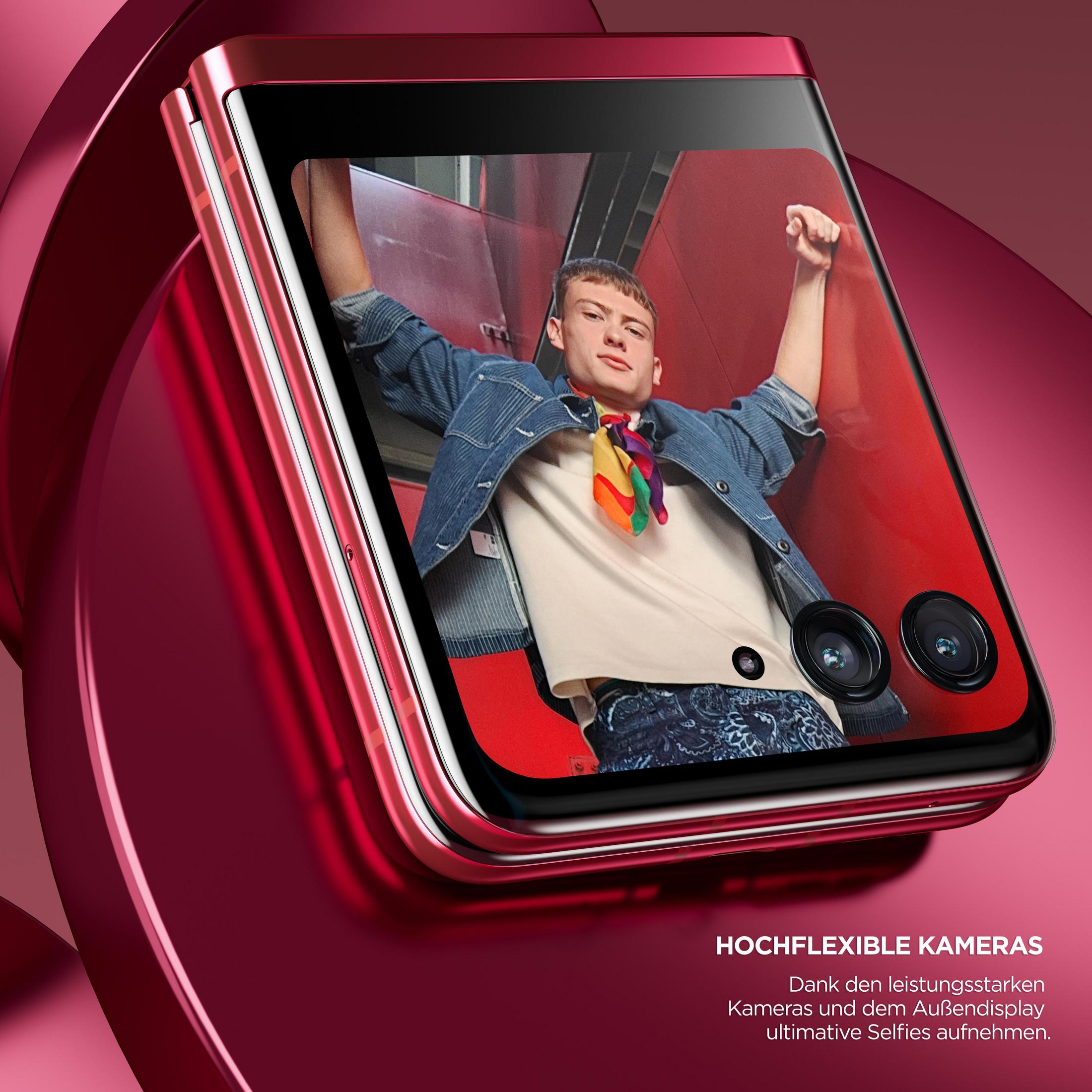 Czerwony telefon z mężczyzną na ekranie, tekst na dole. Czerwone tło.