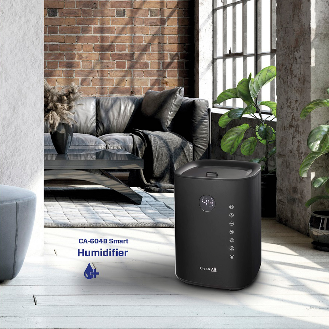 Black humidifier with display in a room. Sofa, brick wall, and plants are visible.