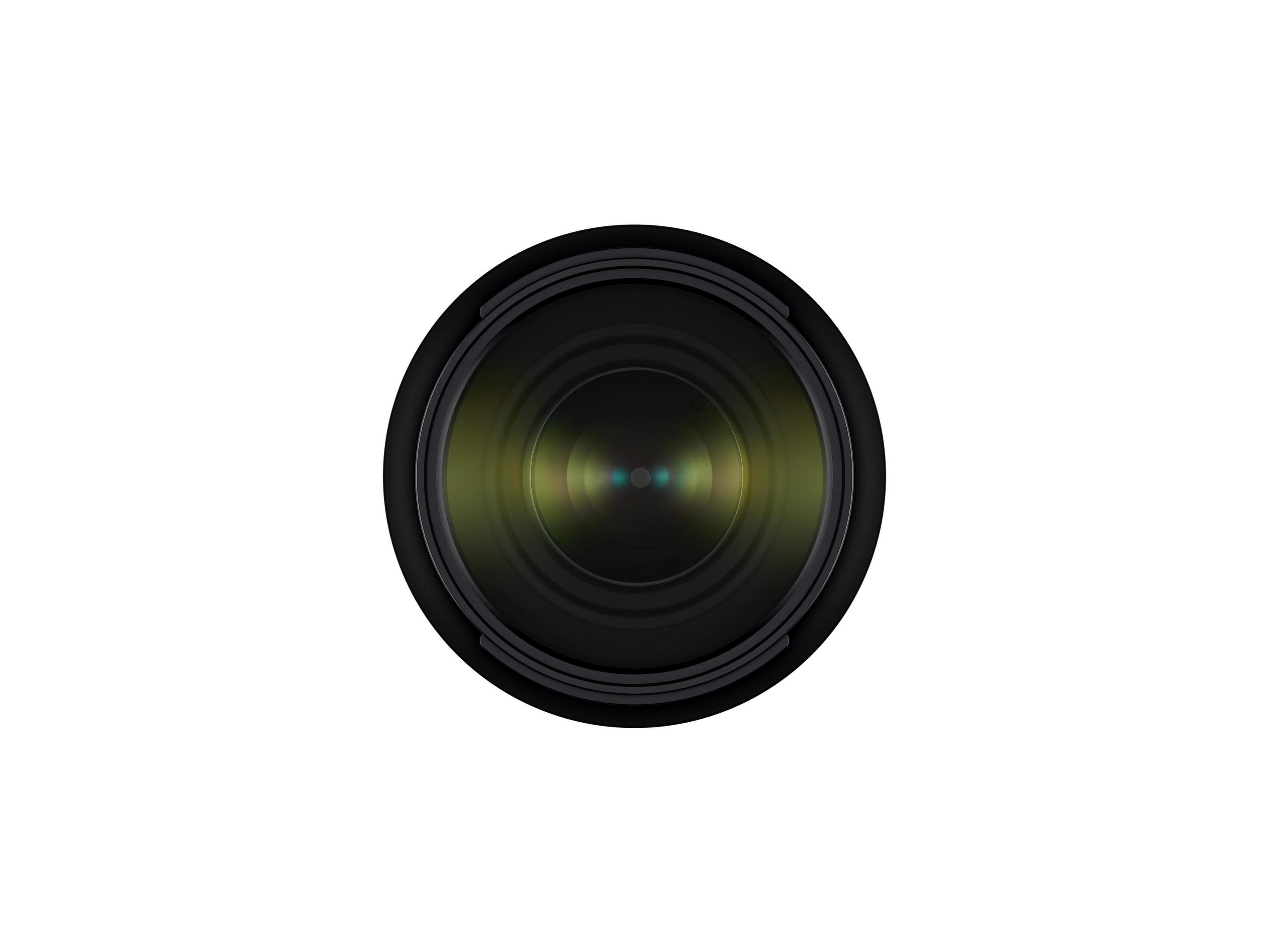 Zbliżenie obiektywu aparatu, czarne z zielonym odbiciem wewnętrznym.
