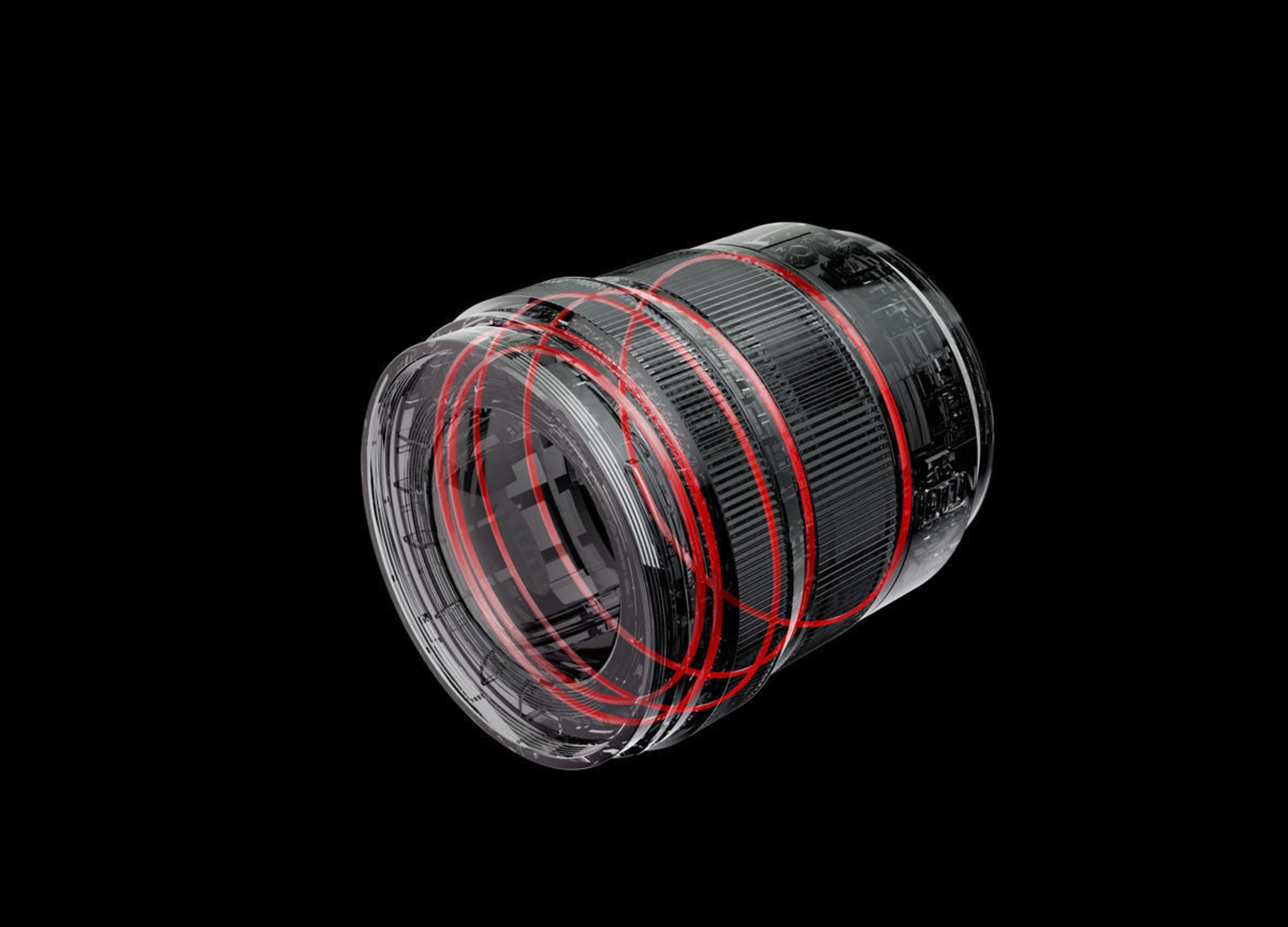 Una lente transparente con anillos internos rojos sobre un fondo negro.