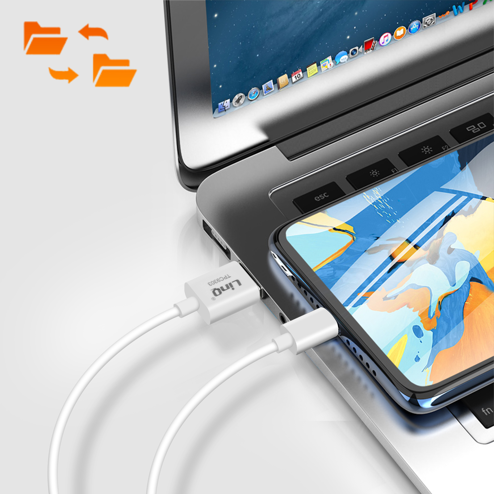 Laptop connesso a un telefono con cavo Lino, trasferimento dati.