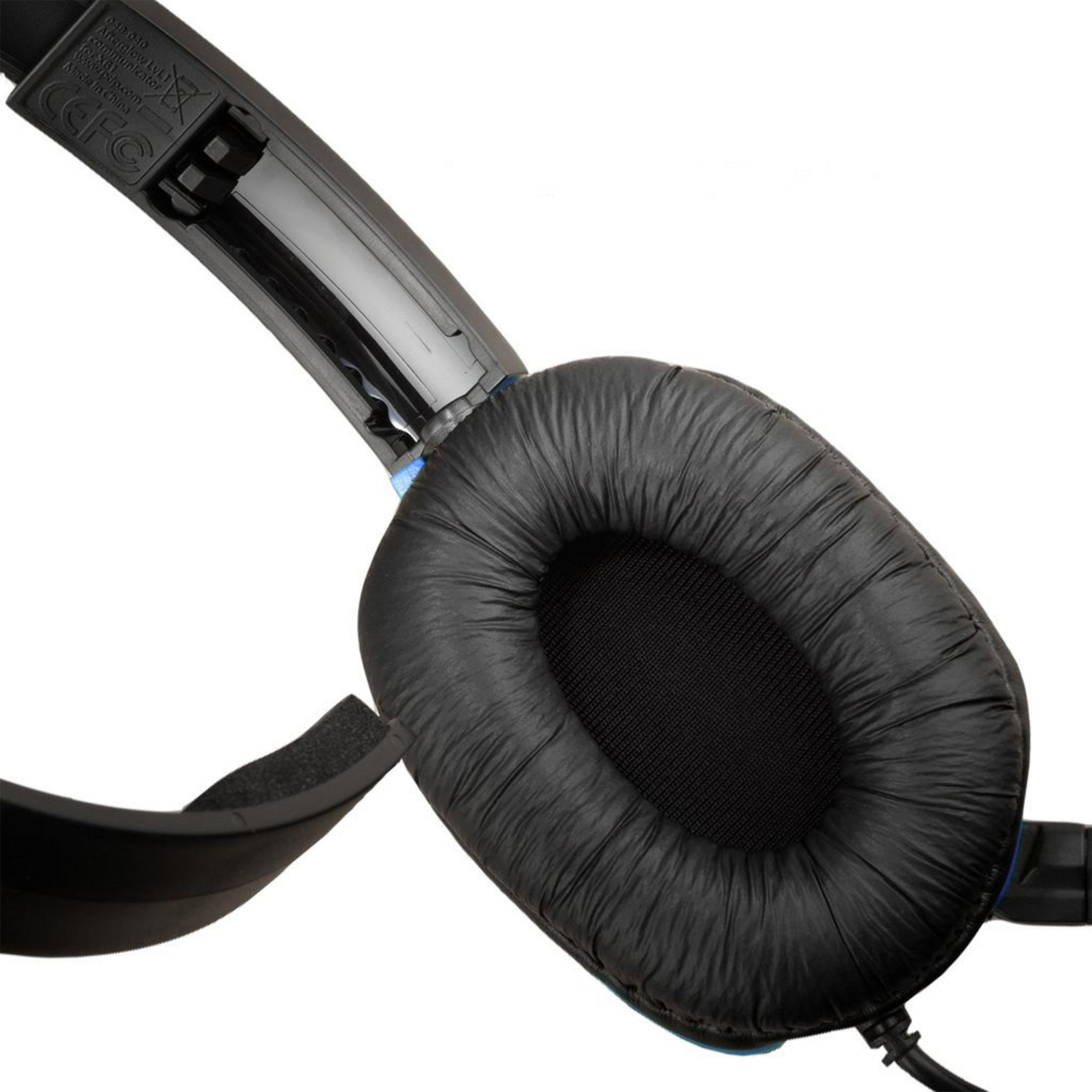 Czarne i niebieskie słuchawki, widoczna jedna słuchawka, zbliżenie na poduszkę.