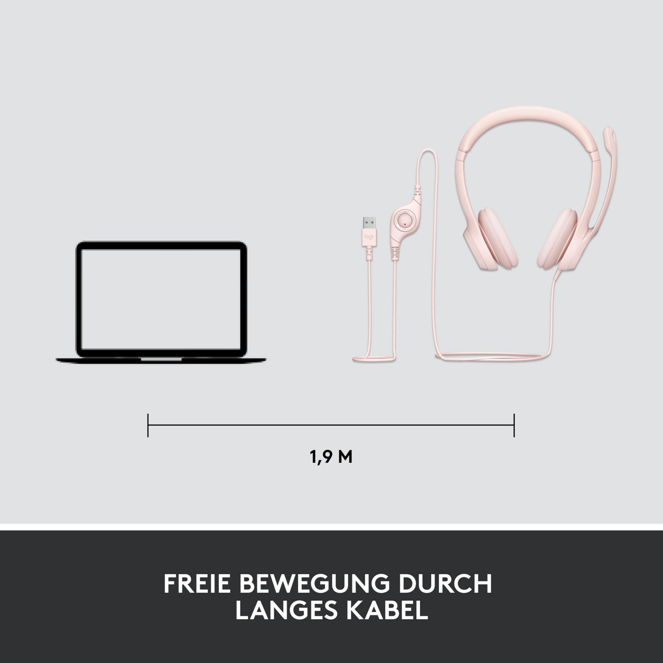 Laptop, rosa Headset und Verbindungskabel ausgelegt. Weißer Hintergrund.
