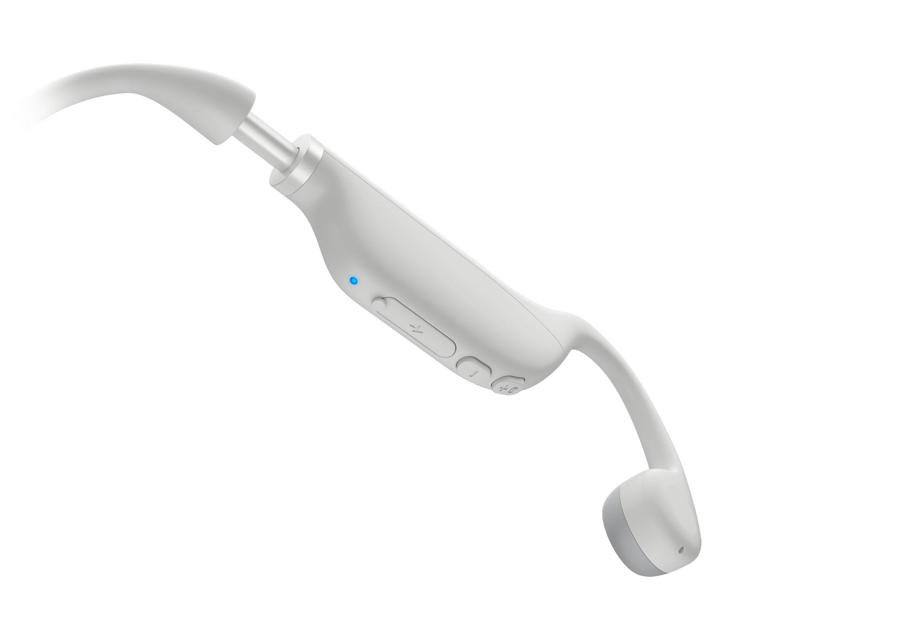 Białe słuchawki bezprzewodowe. Widoczny jest prawy element douszny.