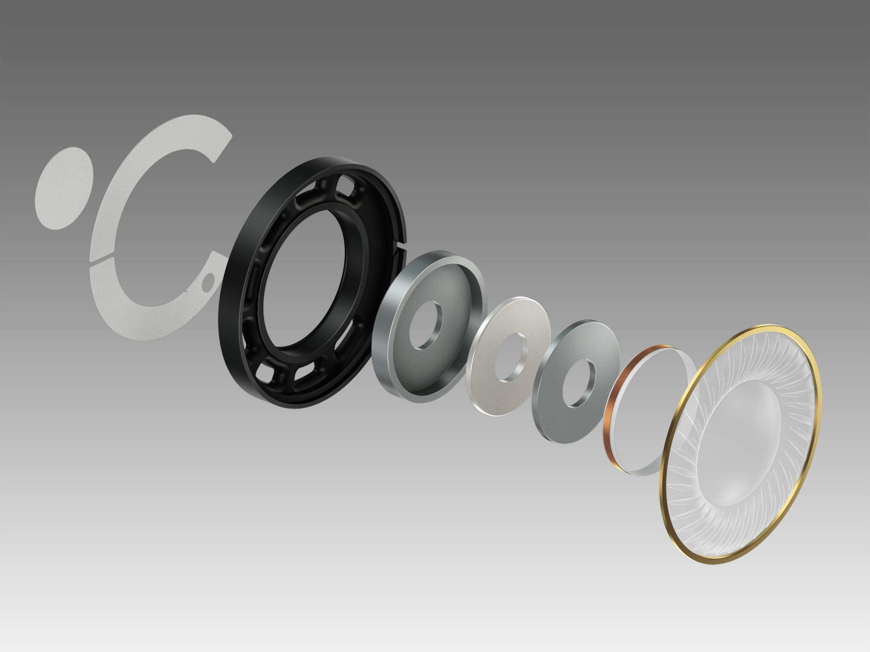 Widok rozstrzelony elementów słuchawek, pokazujący przetworniki, pierścienie i inne części.