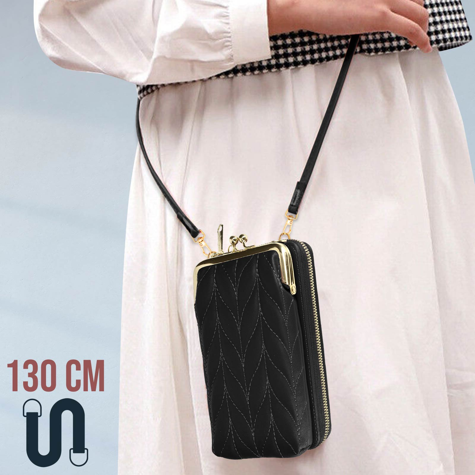 Una borsa nera con chiusura dorata, tracolla da 130 cm, indossata da una persona.