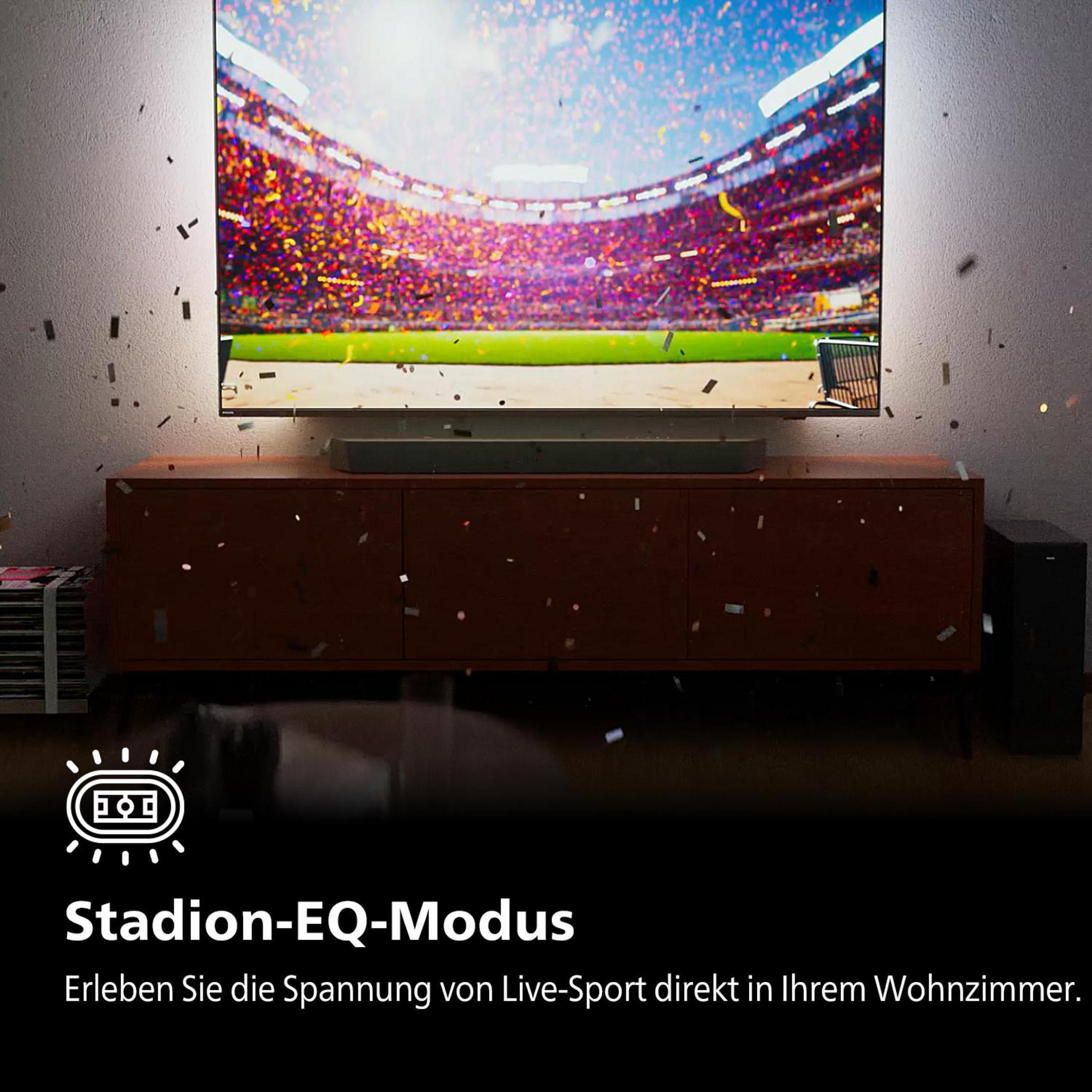 TV-Gerät mit Stadionszene, Soundbar darunter, Text 'Stadion-EQ-Modus'.