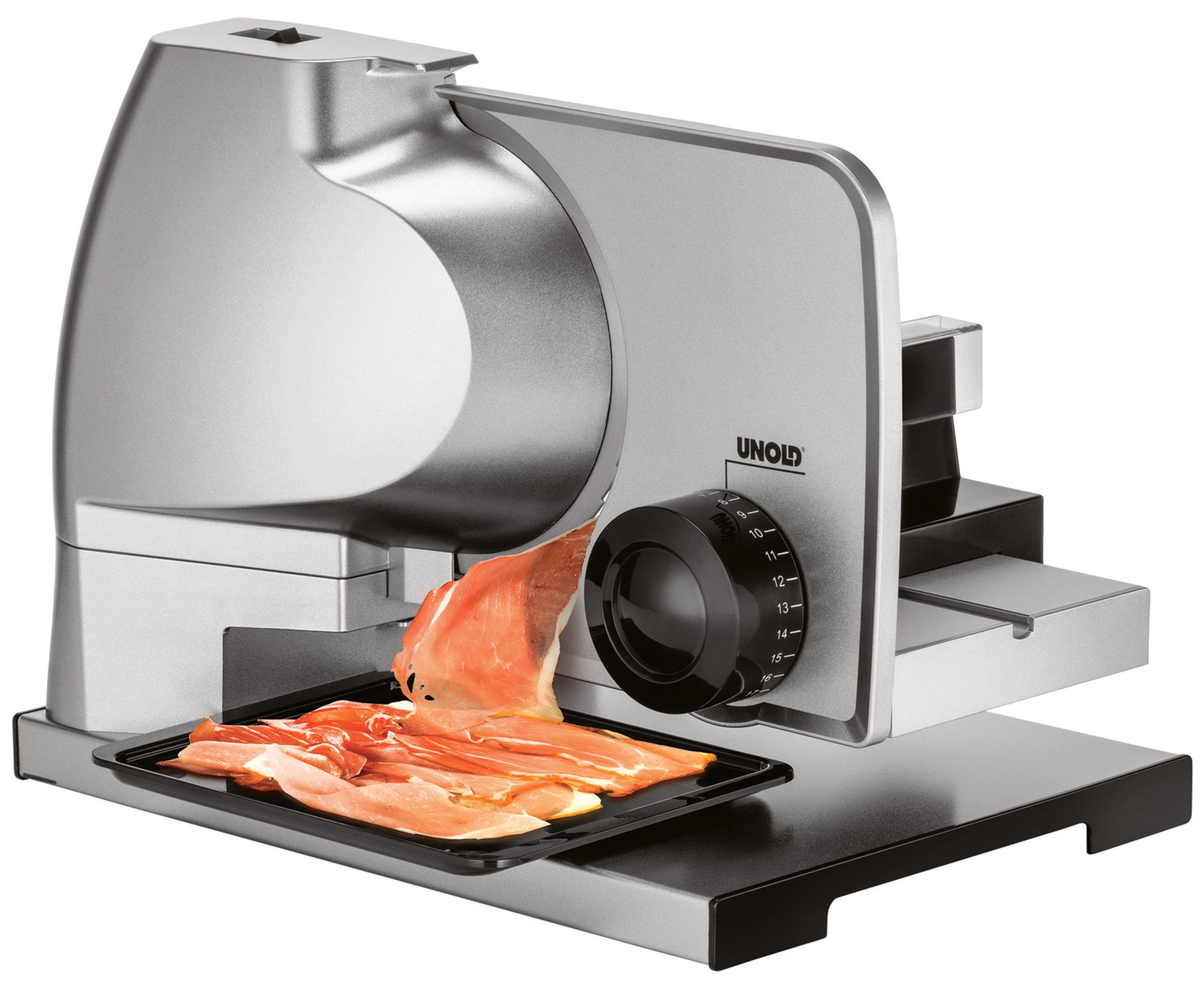 Srebrna krajalnica do mięsa z czarnym ostrzem. Pokrojona szynka parmeńska na czarnej tacy.