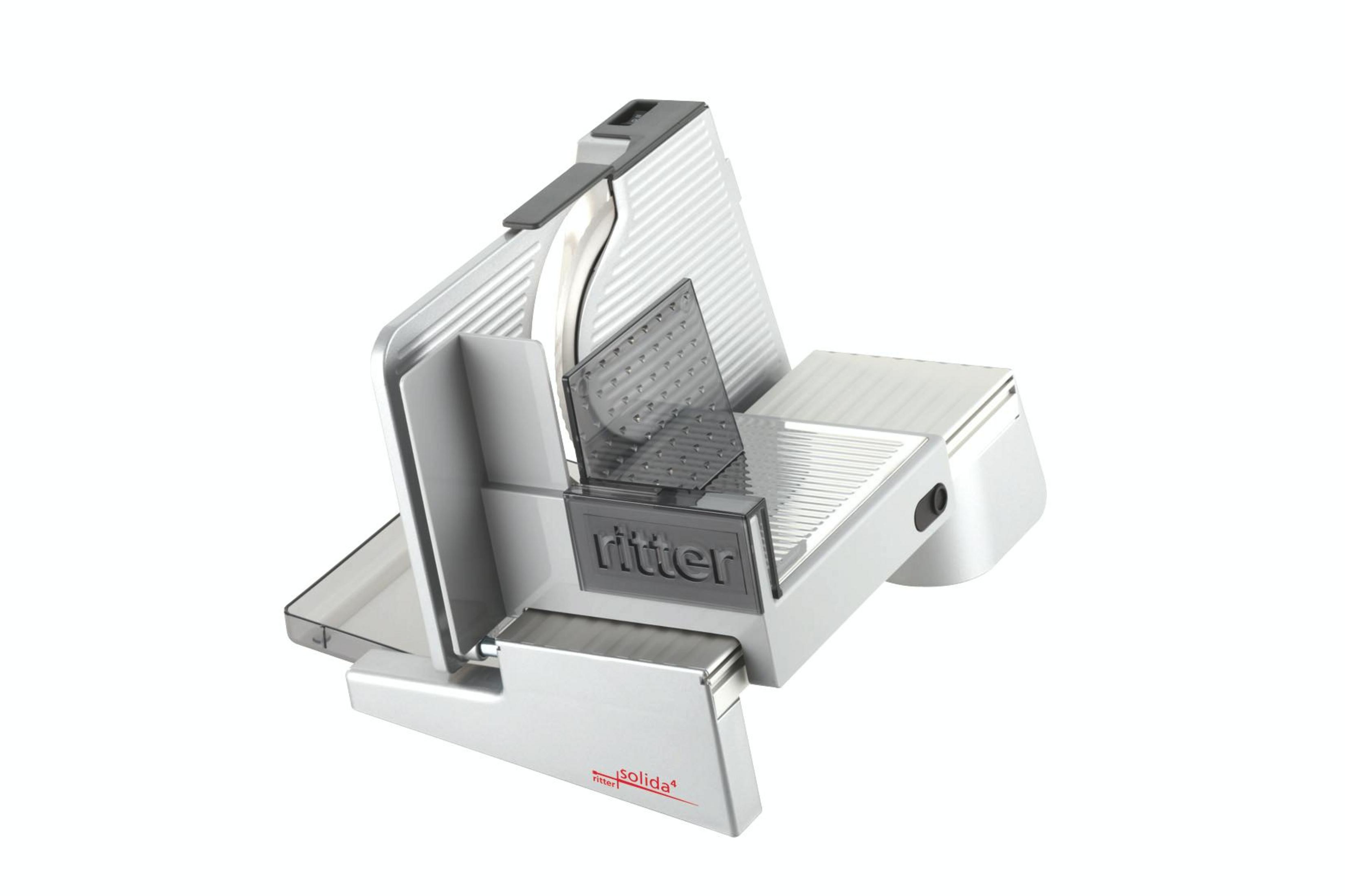 Biało-szara krajalnica do żywności z ostrzem i deską do krojenia, na białym tle.