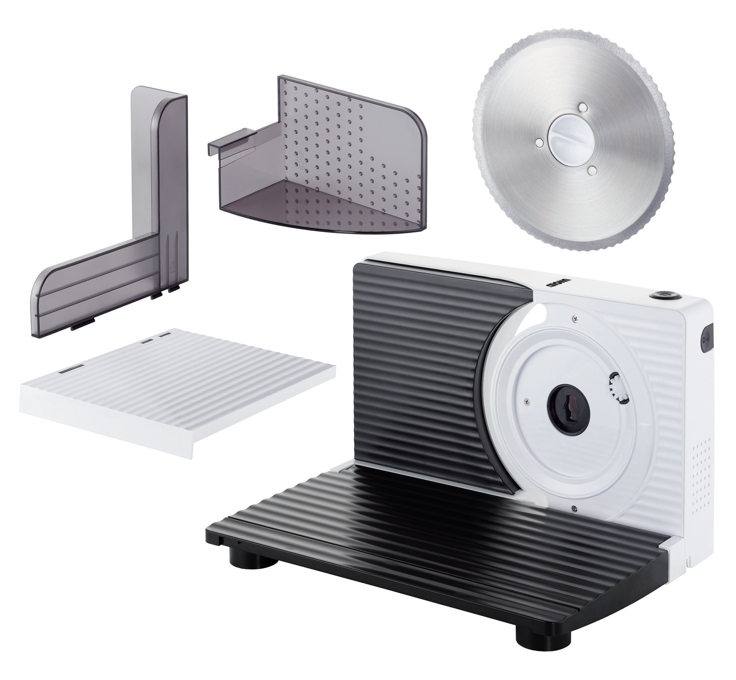 Zdemontowana krajalnica do żywności z ostrzem i innymi częściami. Główny korpus jest biało-czarny.