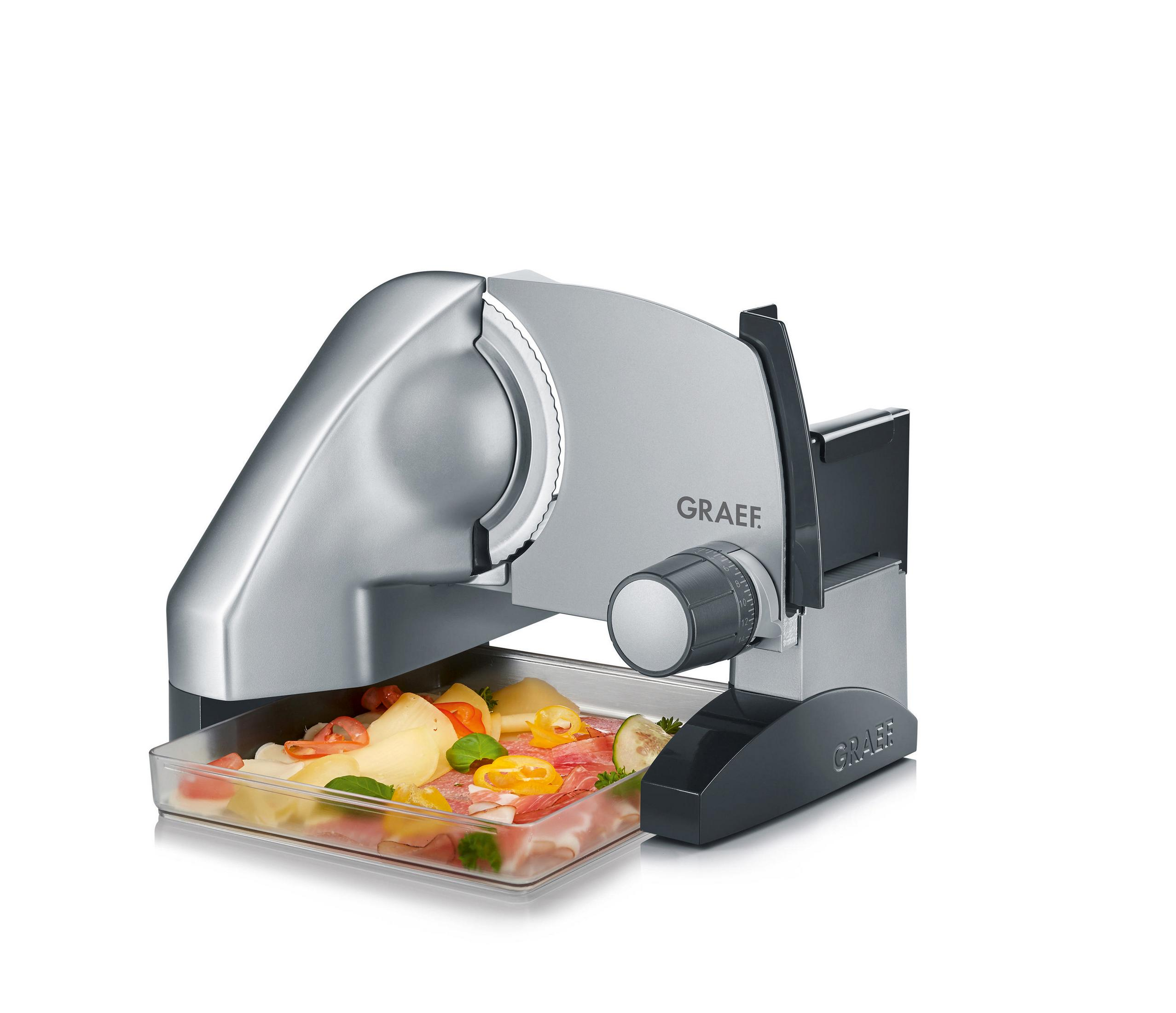 Srebrna krajalnica do mięsa z jedzeniem na tacy. Widoczna marka GRAEF.