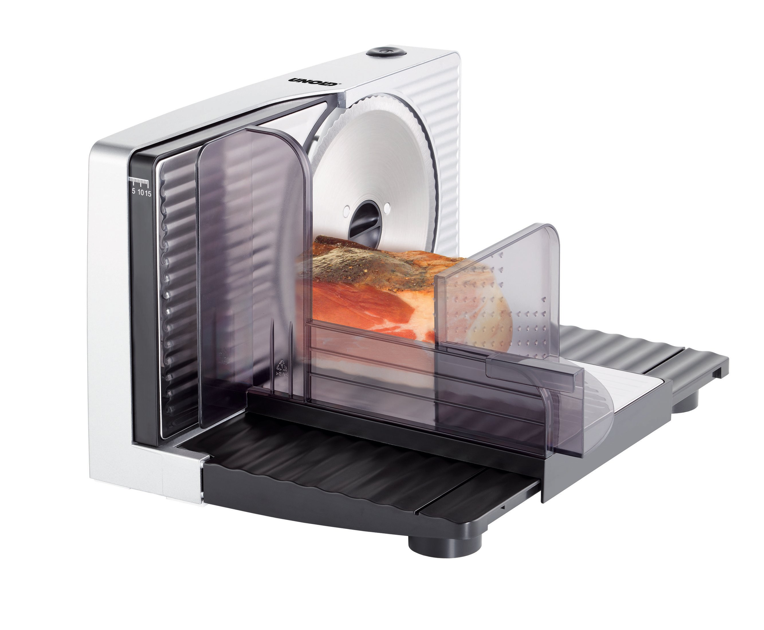 Biało-srebrna krajalnica do mięsa z mięsem. Ma ostrze i prowadnicę do krojenia.