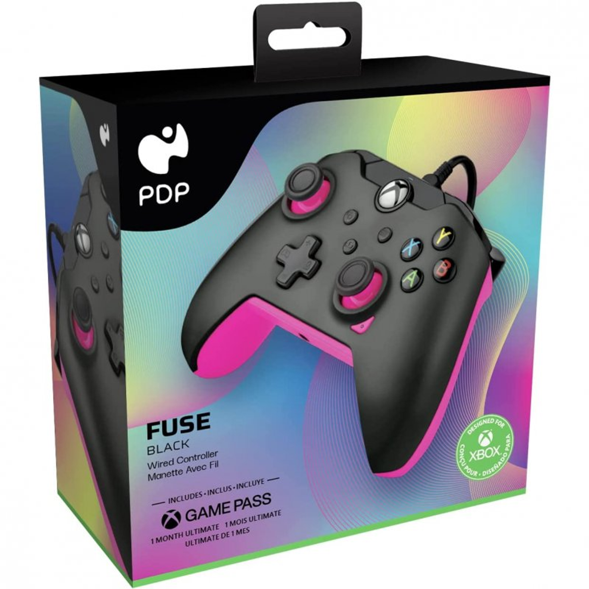 Manette Xbox noire et rose dans sa boîte. La boîte a un fond coloré et inclut 'GAME PASS'.