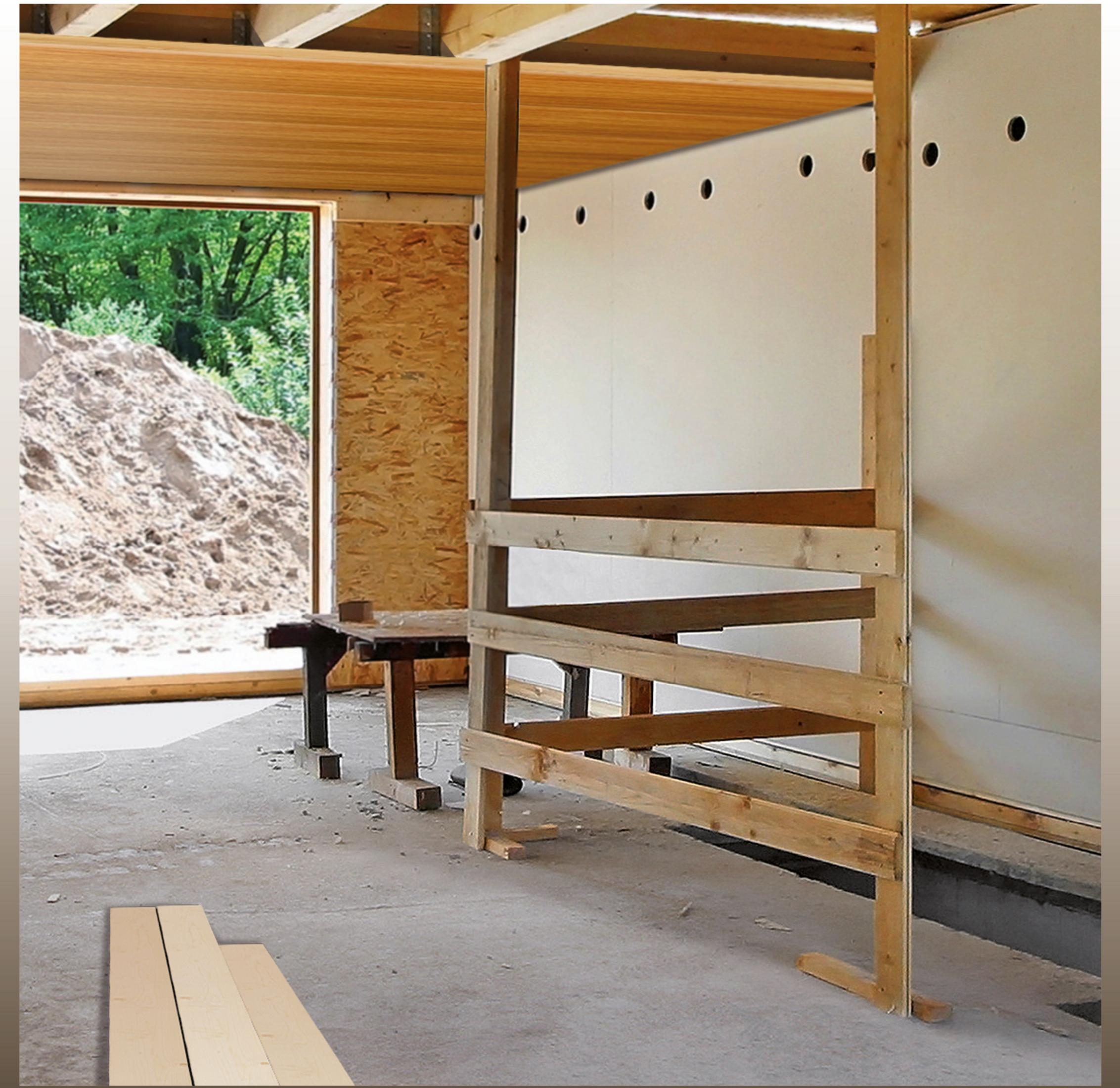 Eine Baustelle mit Holzrahmen und Blick nach draußen.