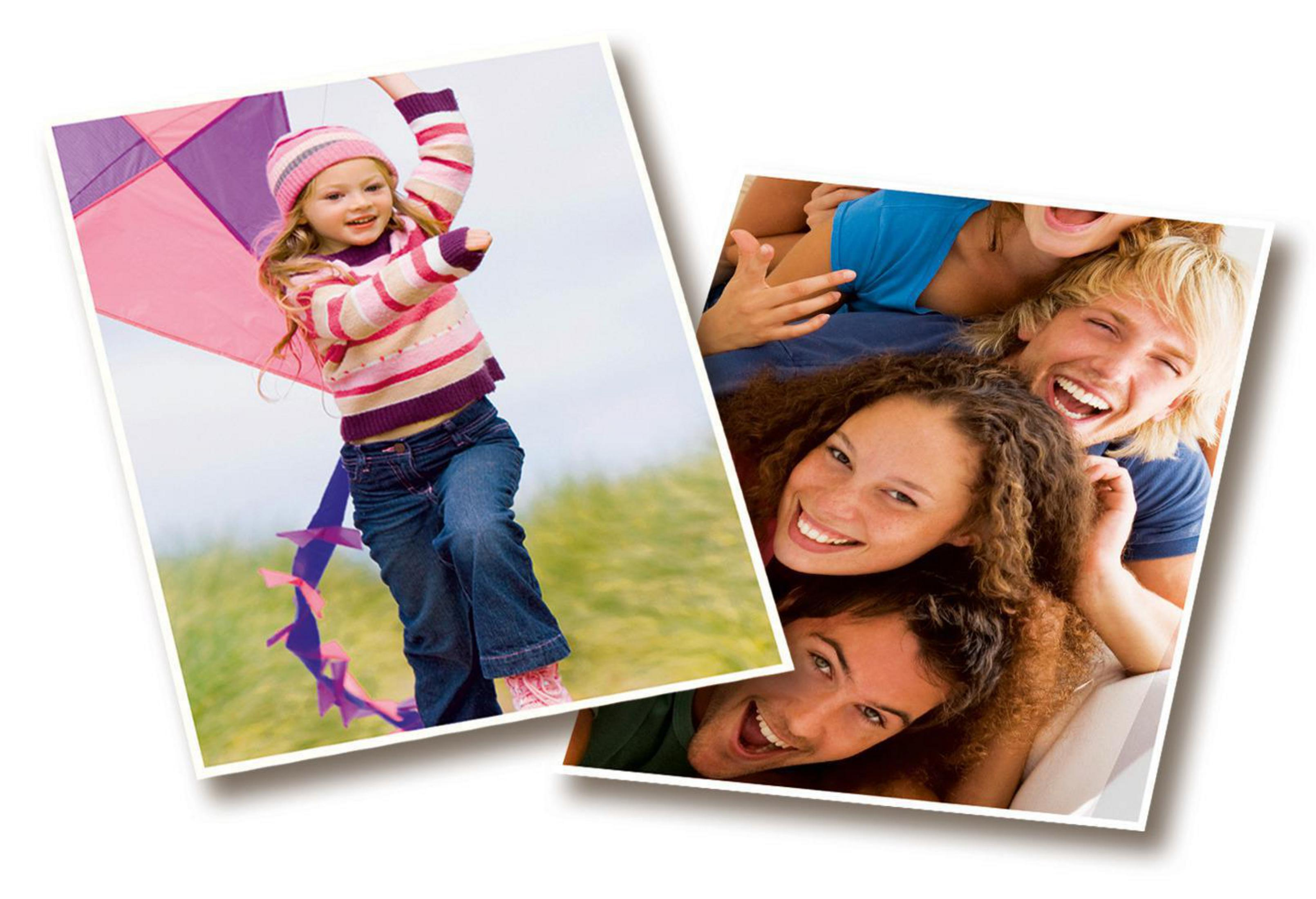 Dziewczynka puszcza latawiec, uśmiechnięta. Grupa ludzi uśmiechających się i śmiejących.