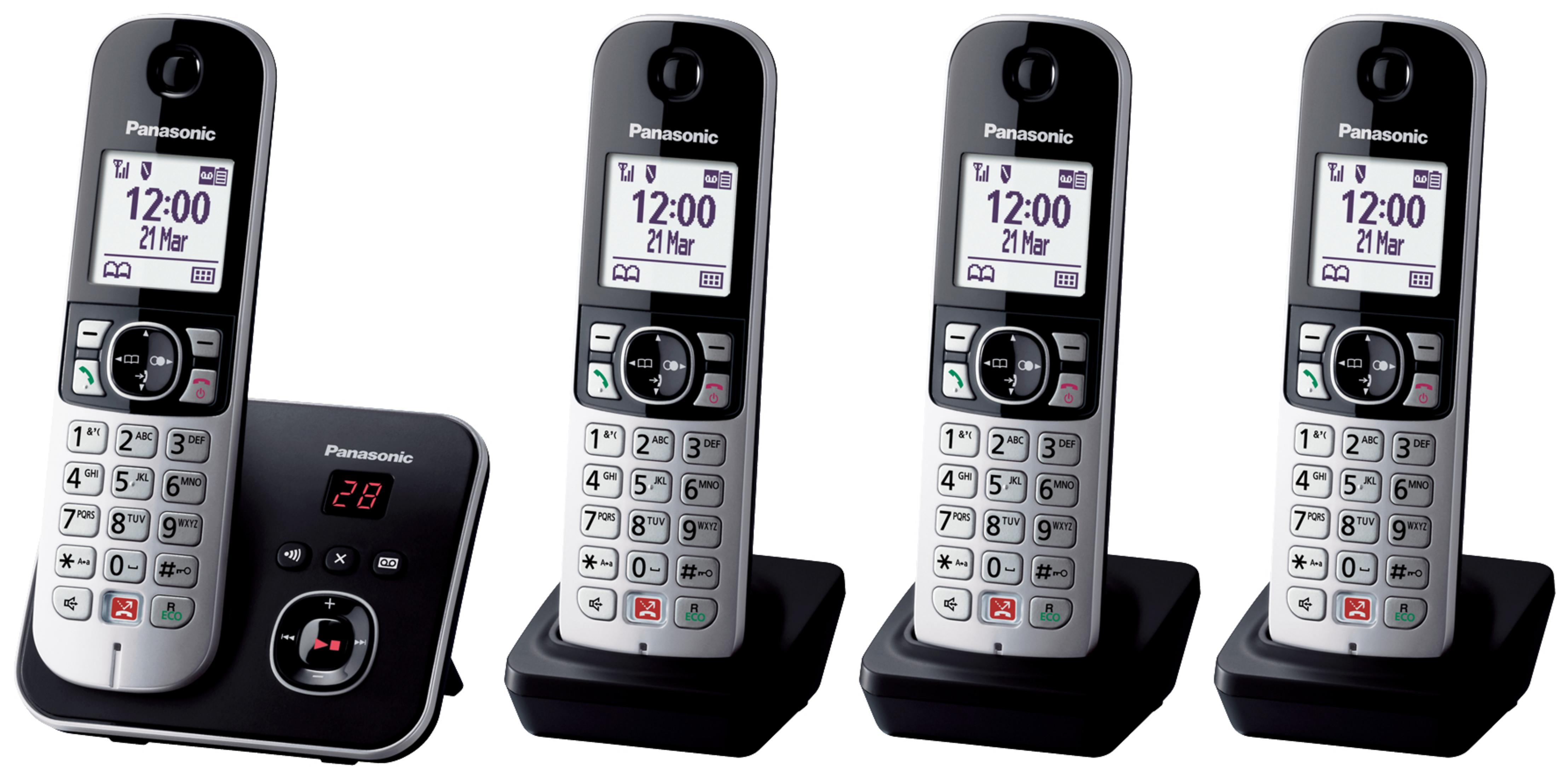 Vier schnurlose Telefone von Panasonic und eine Ladestation. Die Mobilteile sind schwarz und weiß.