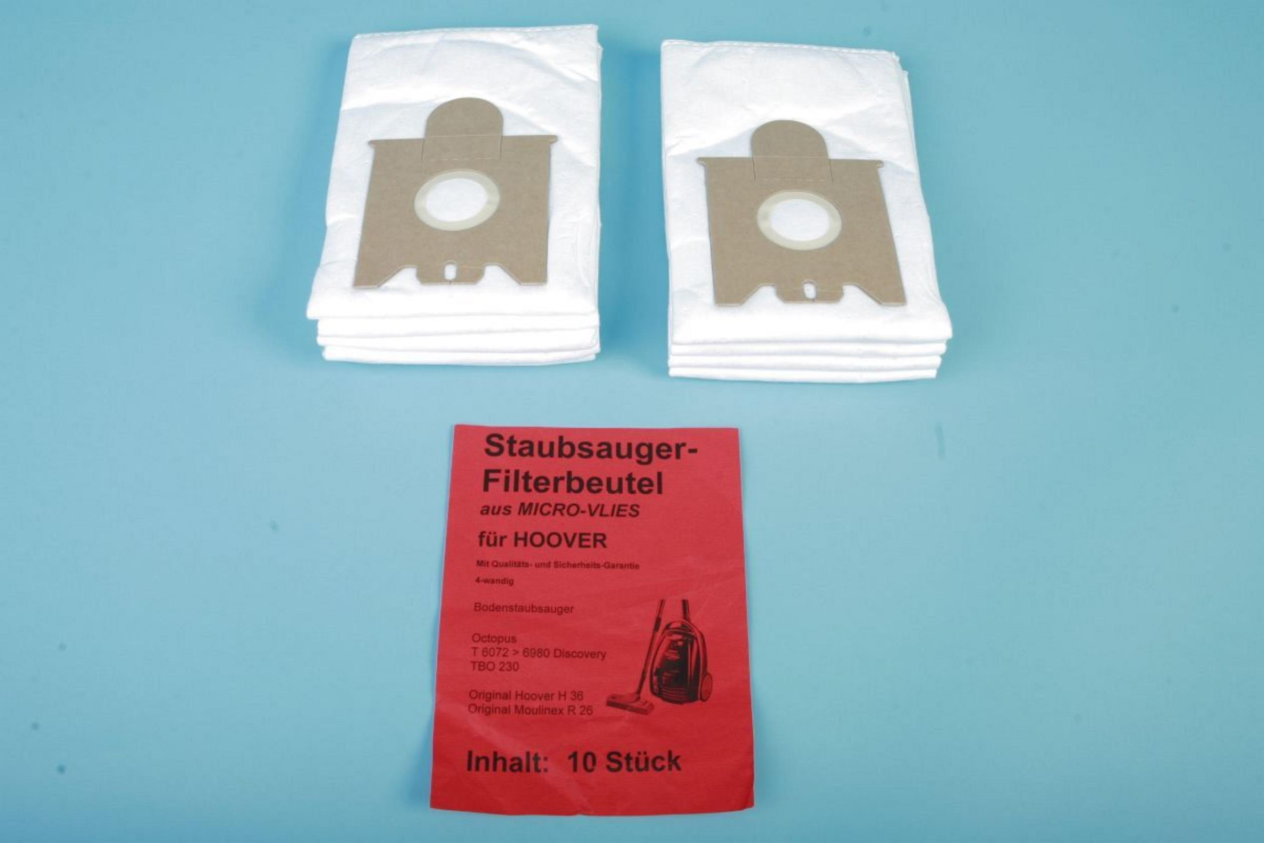 Zwei weiße Staubsaugerbeutel mit braunen Kartoneinsätzen und eine rote Filterbeutelverpackung.