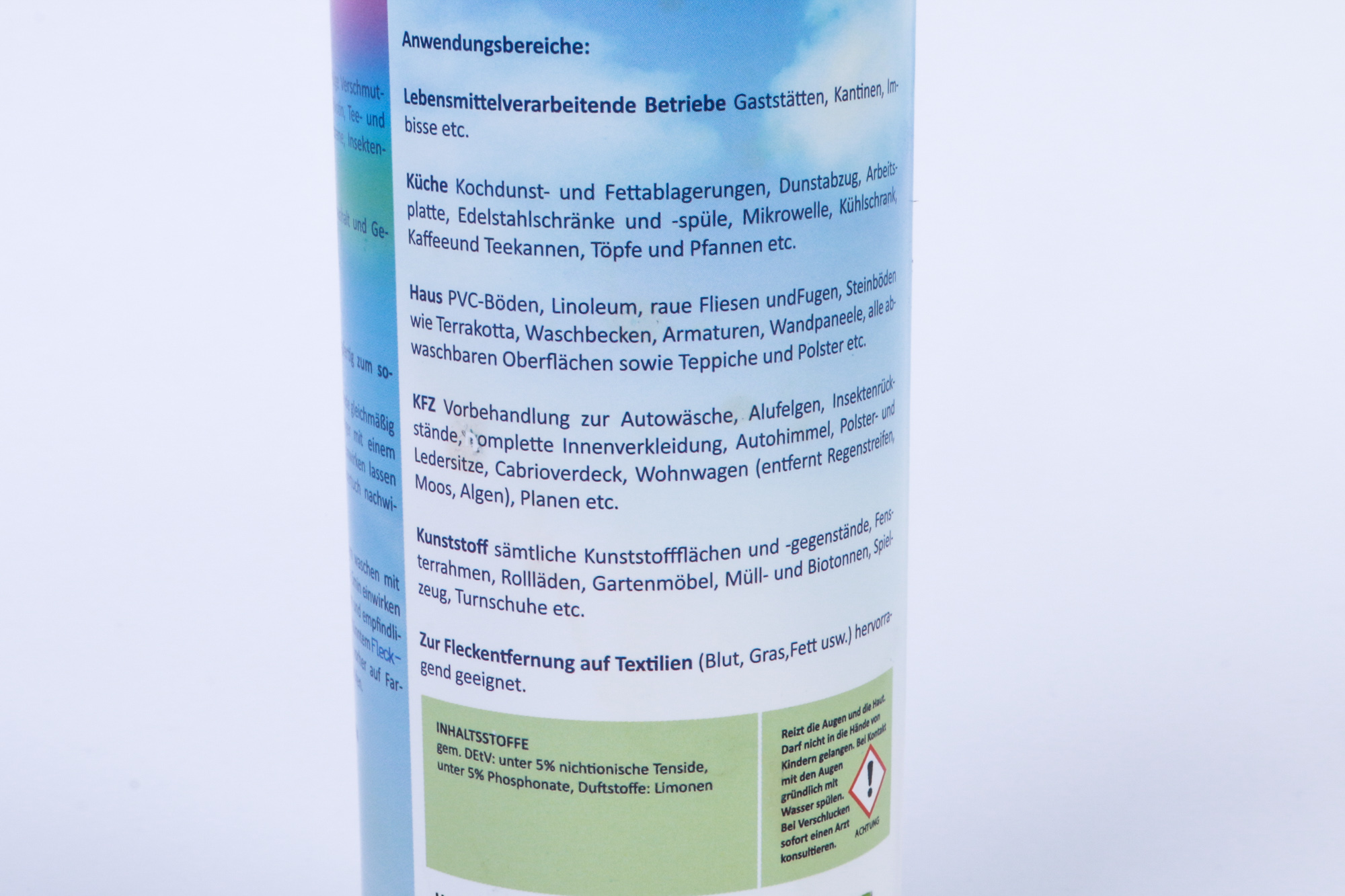 Text auf einer Flasche, die Reinigungsanwendungen auflistet. Text ist auf Deutsch.