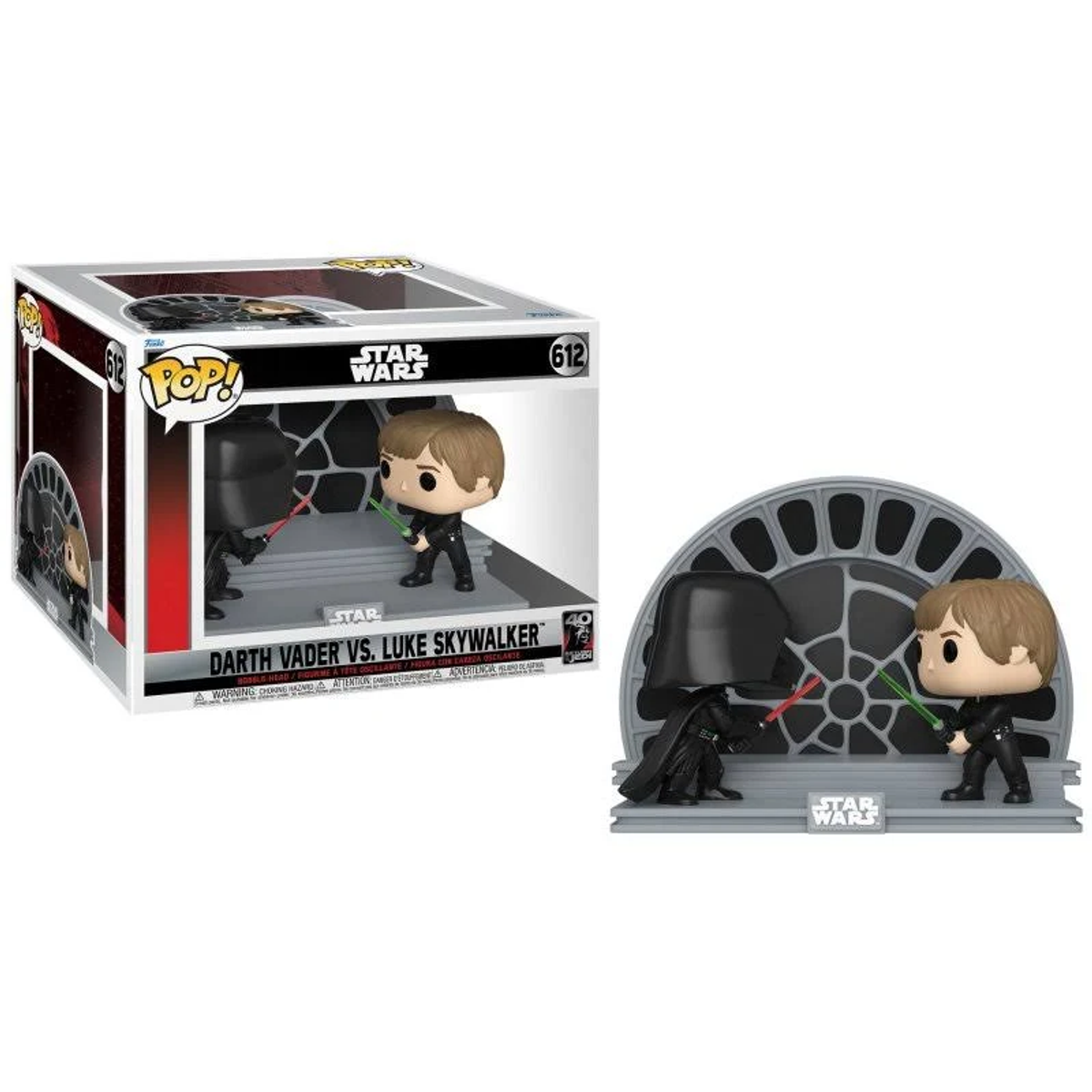 Figuras de Darth Vader y Luke Skywalker en una caja y un soporte, de Star Wars.