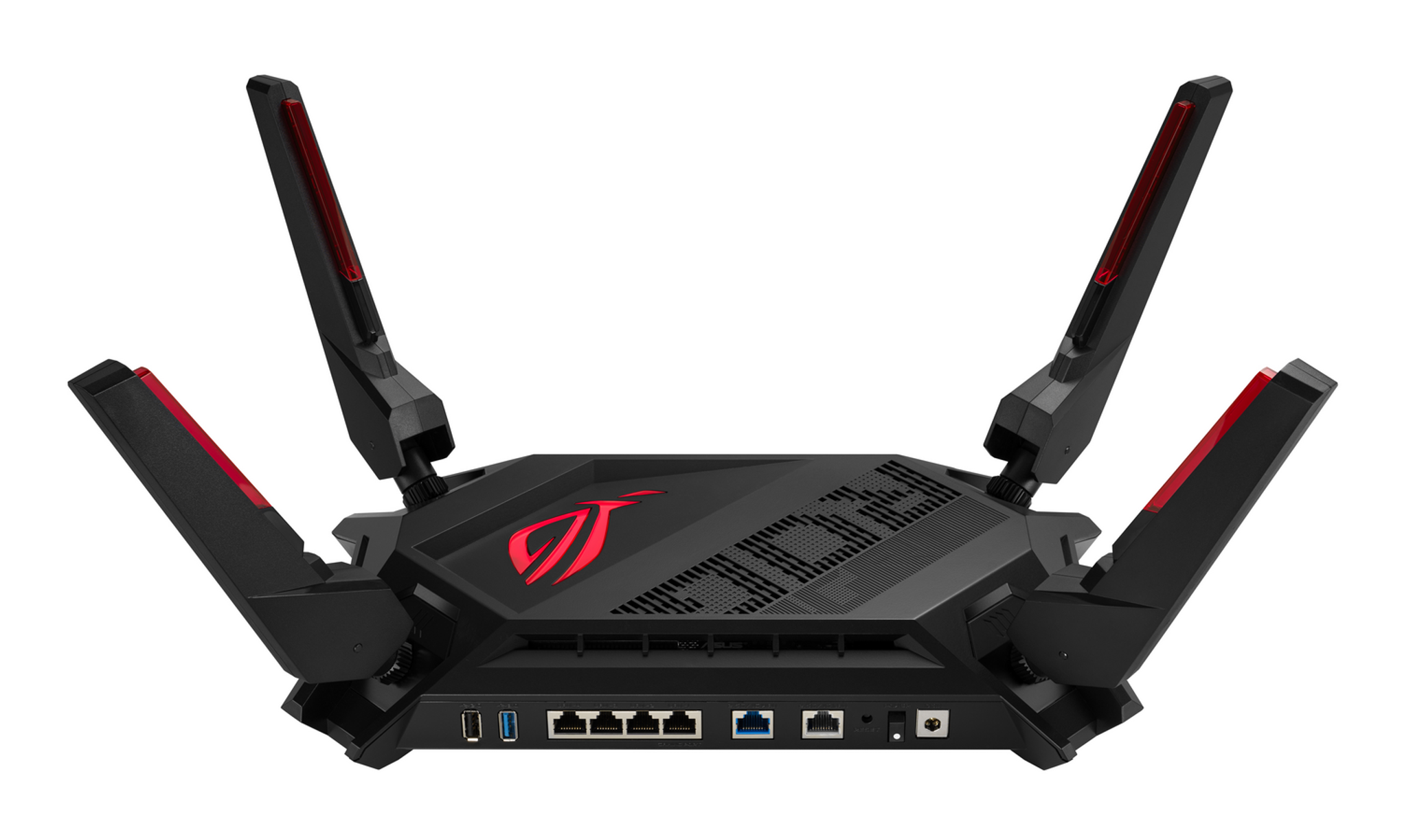 Czarny i czerwony router z czterema antenami. Znajduje się na białej powierzchni.