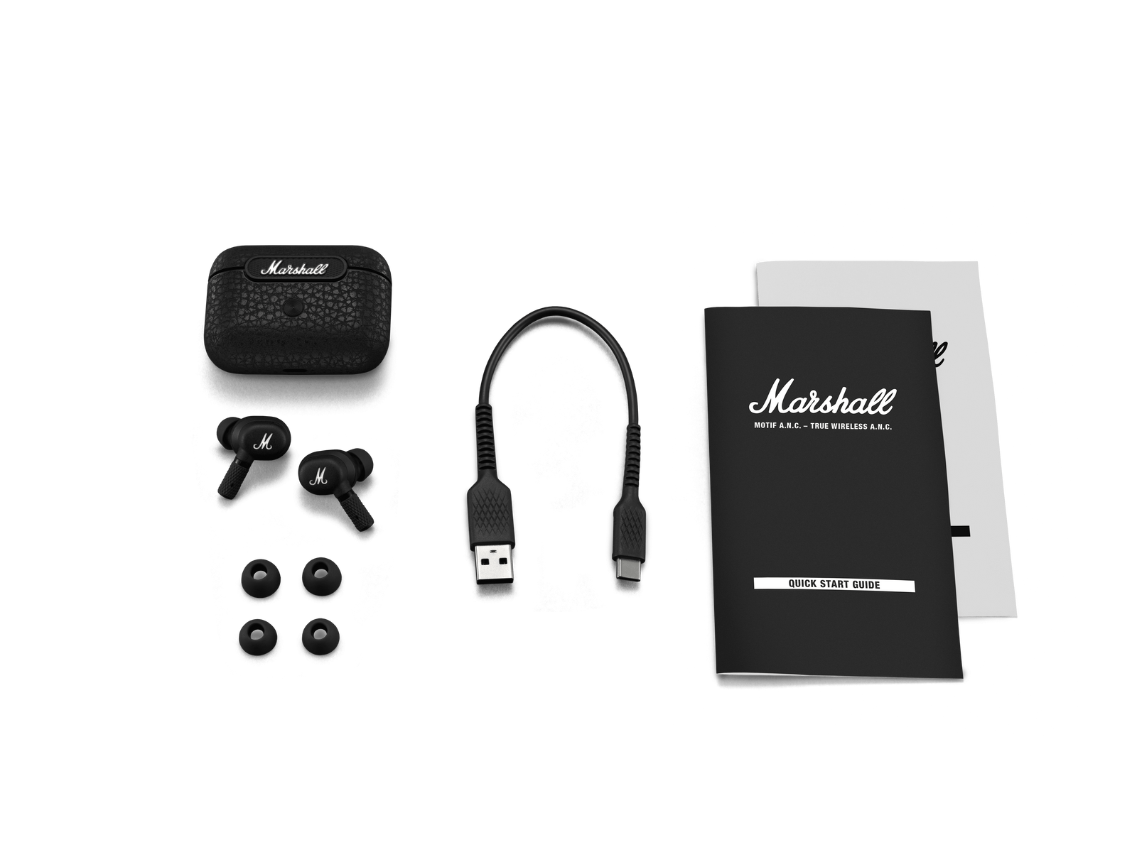 Schwarze Marshall-Ohrhörer mit Zubehör. Enthalten sind das Etui, das Kabel und die Anweisungen.