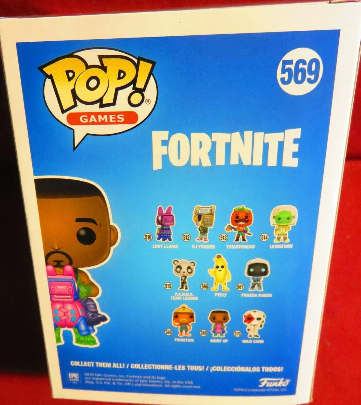 Pudełko z figurką Funko Pop. Tył pokazuje postacie z Fortnite.
