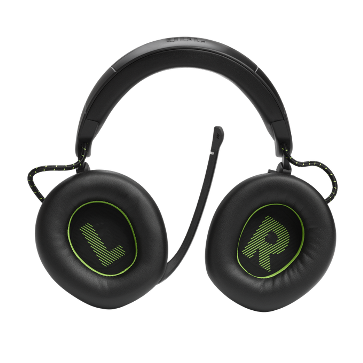 Czarne słuchawki JBL z zielonymi akcentami. Na nausznikach zielone litery 'L' i 'R'. Czarne tło.