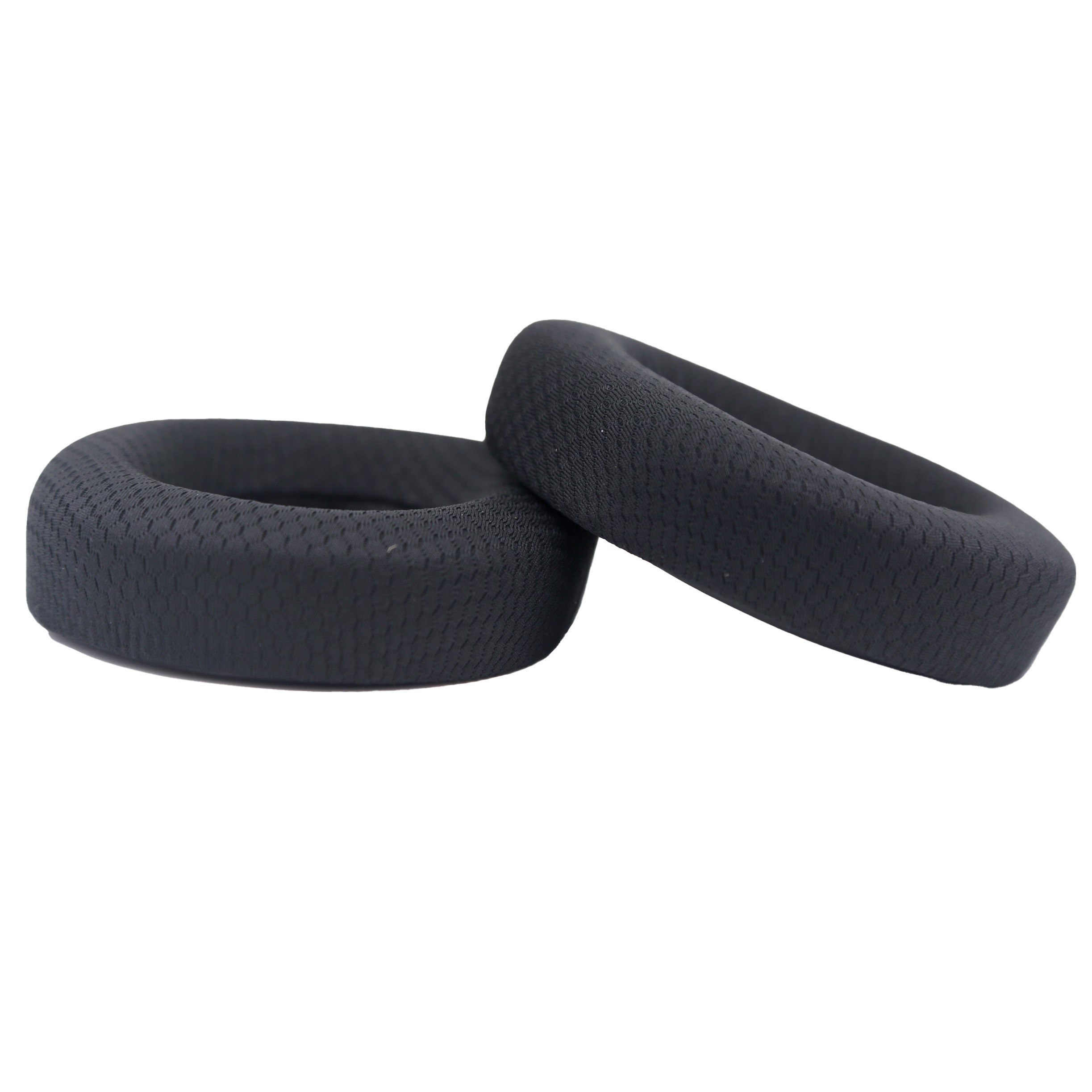 Dwie czarne, okrągłe nauszniki na białym tle.