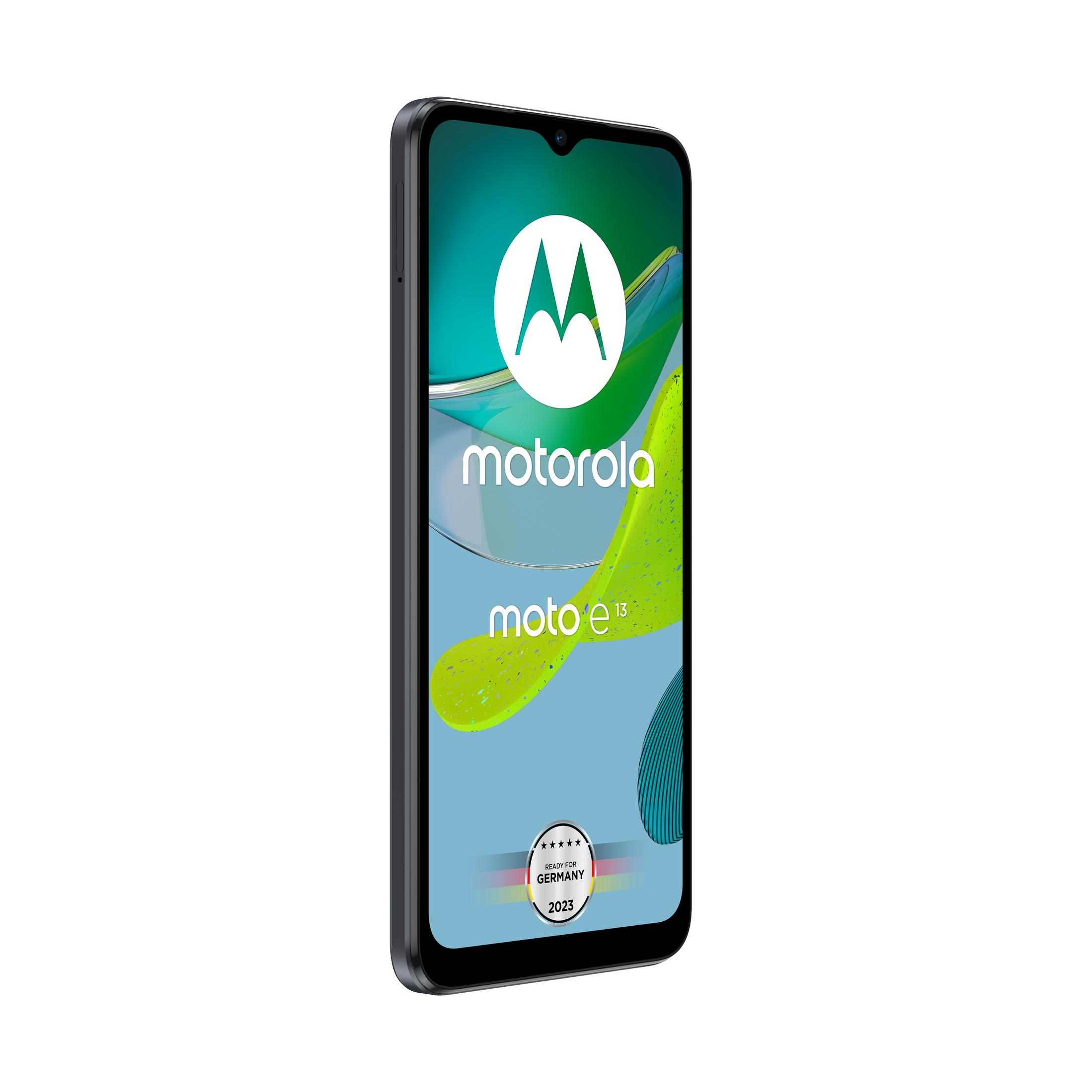 Smartfon z logo motorola na ekranie. Telefon jest czarno-biały.