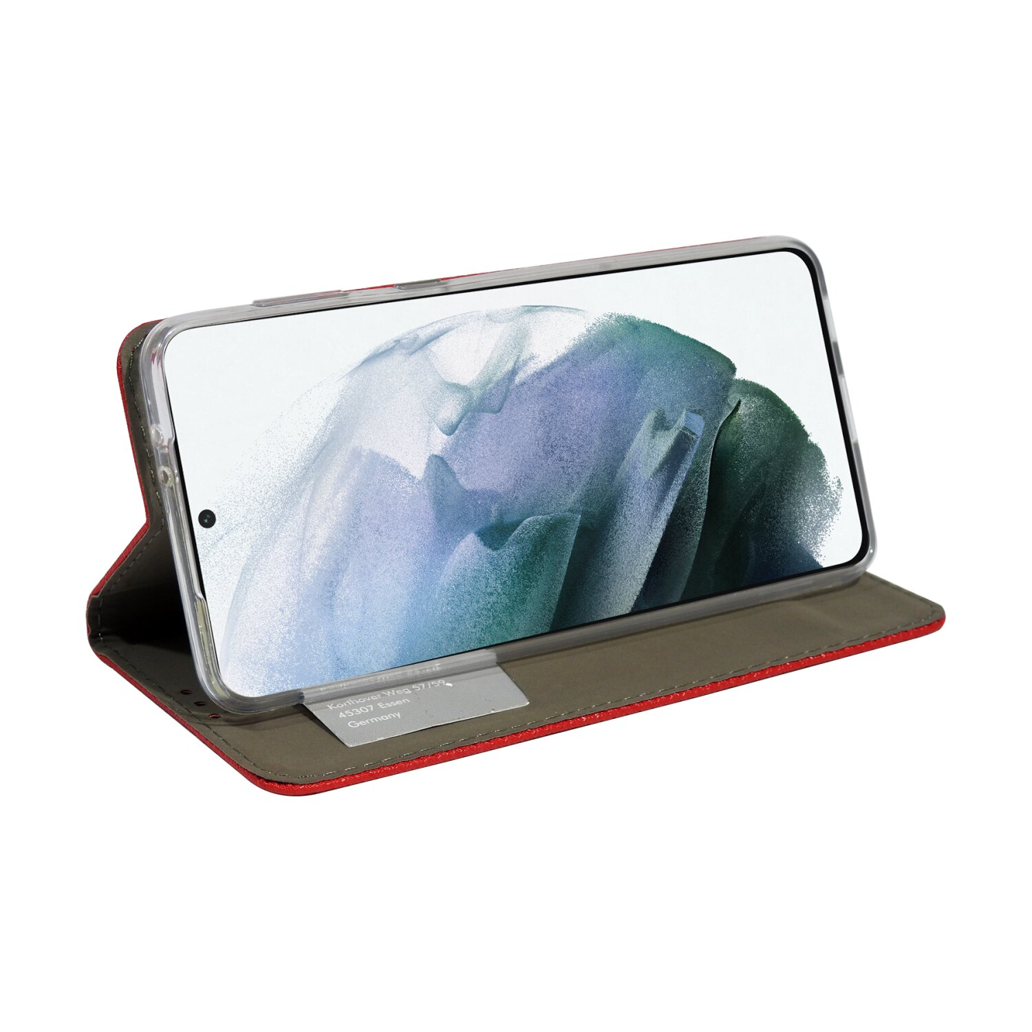 Telefono in custodia rossa, aperto, su supporto. Testo sullo schermo.