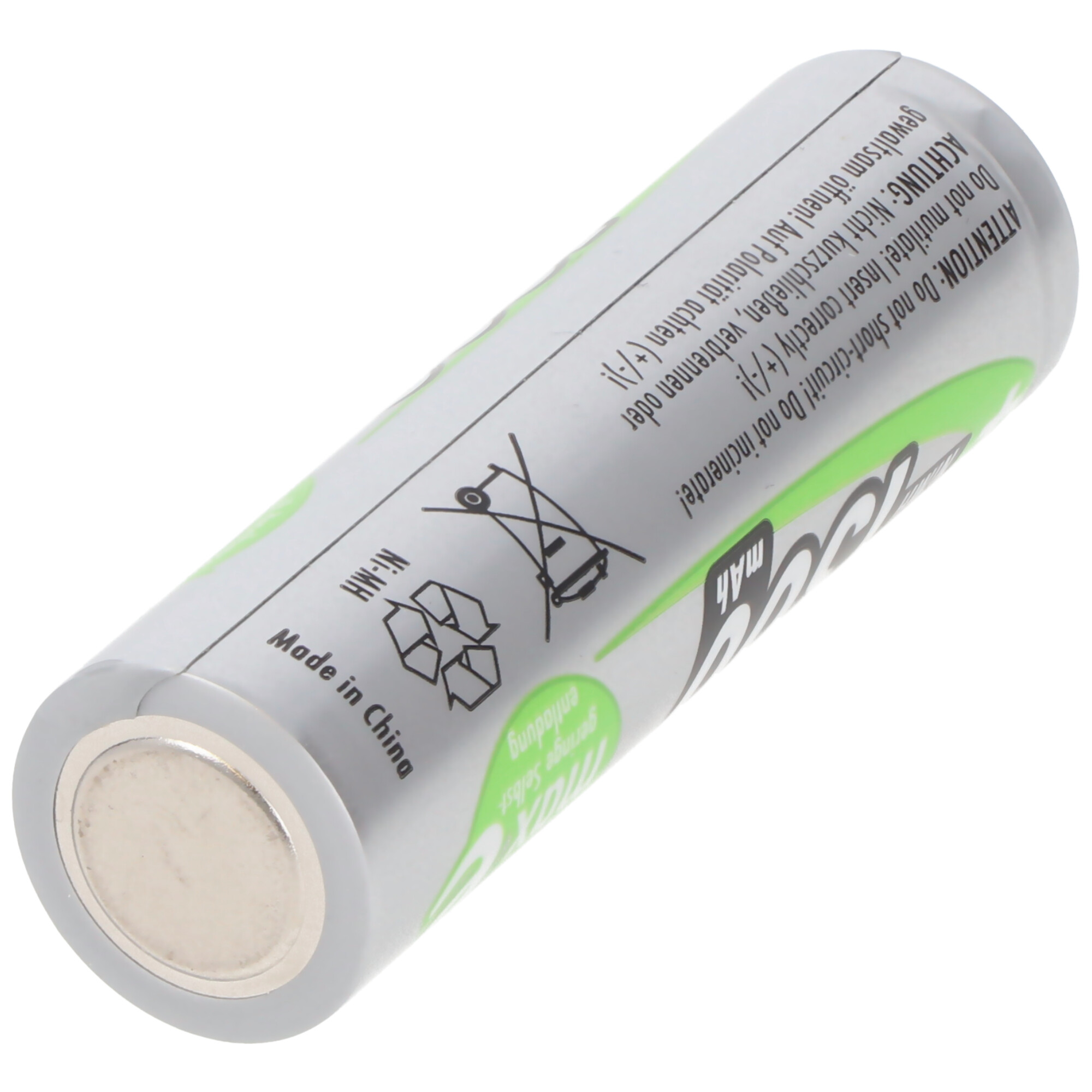 A green and silver cylindrical battery with warning labels and a metallic end.