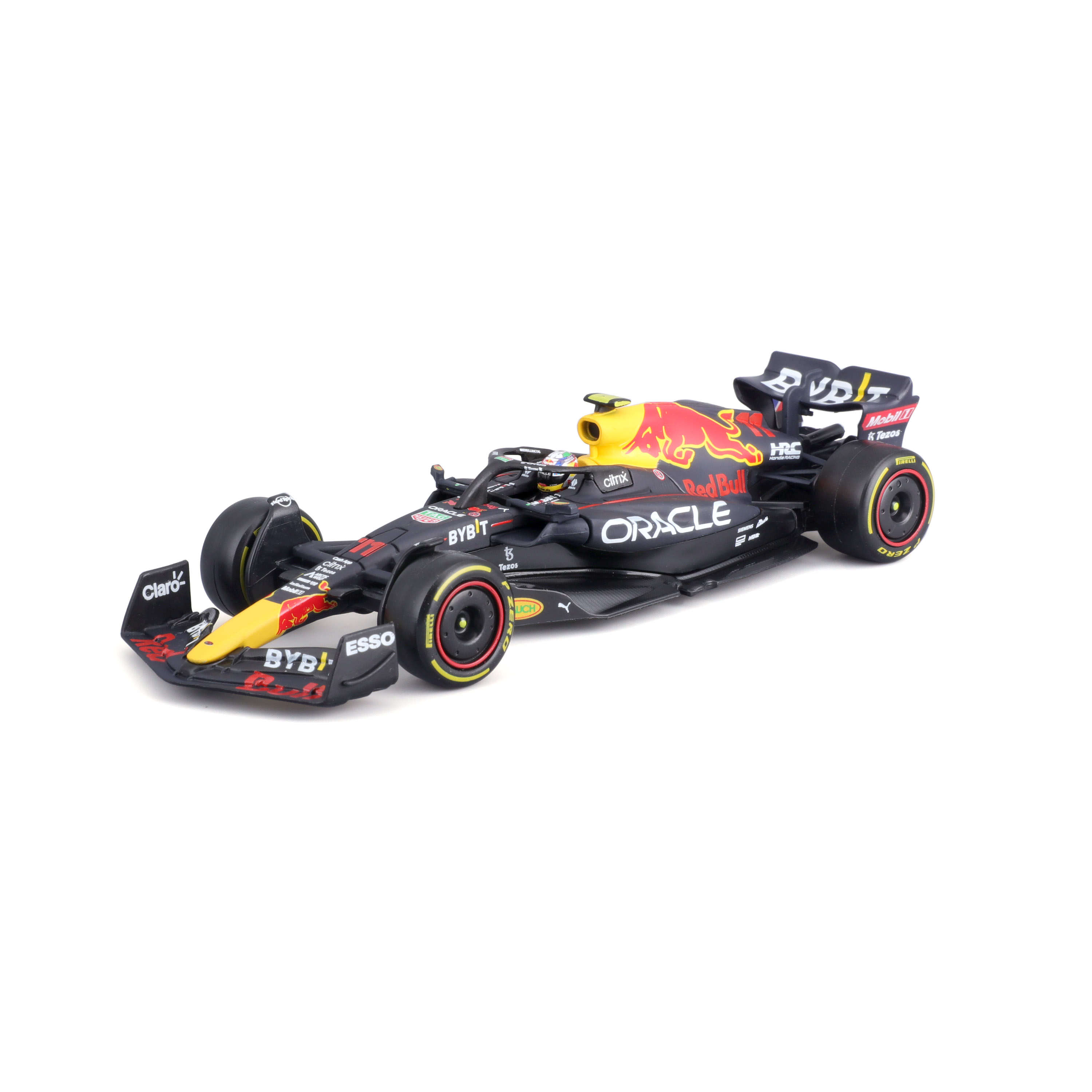Un'auto da corsa di Formula 1 Red Bull, nera con dettagli rossi e gialli, su una superficie bianca.