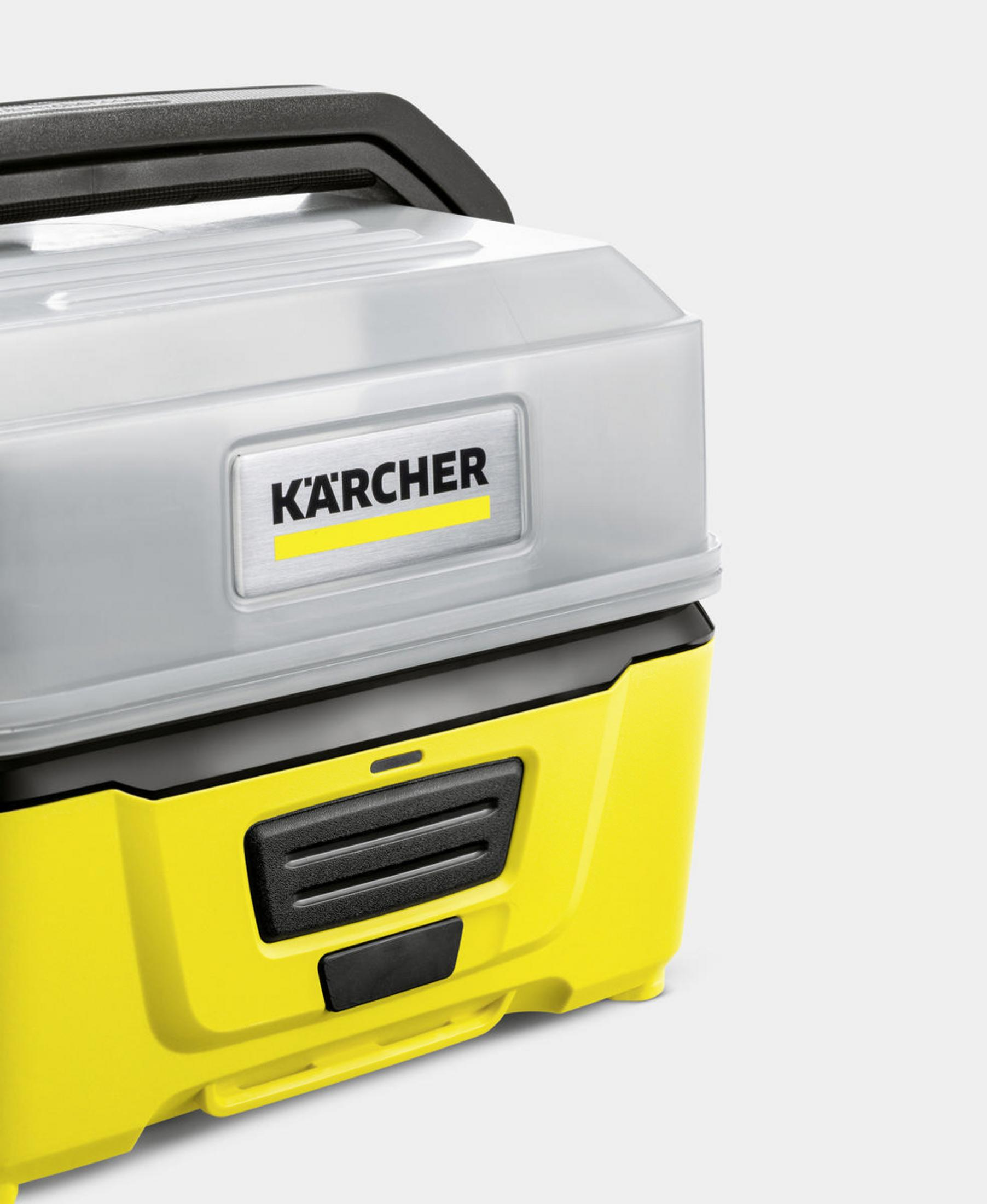 Yellow and grey Kärcher vacuum cleaner with the brand logo visible. It is on a light grey background.