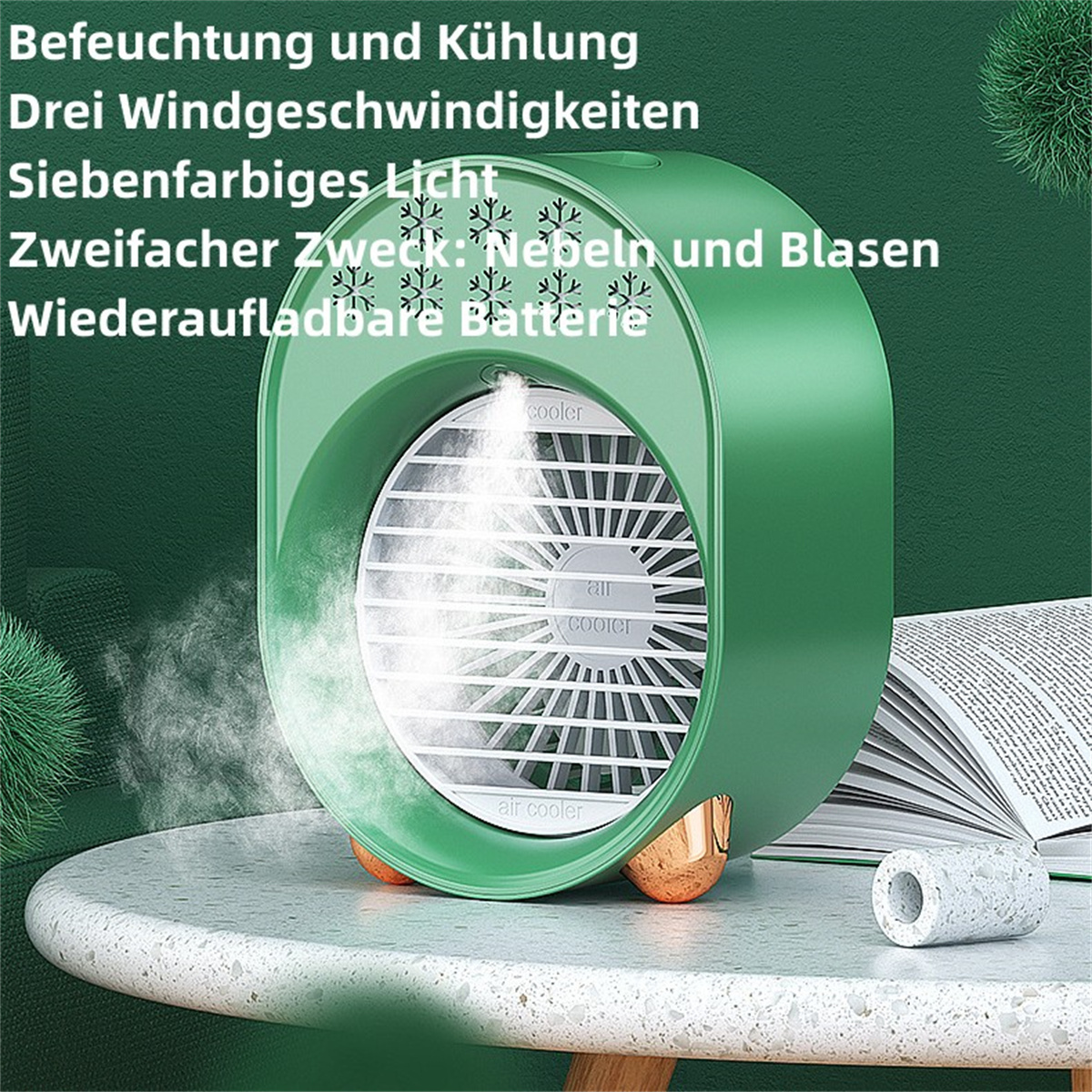Grüner Luftkühler auf einem Tisch. Text darauf. Offenes Buch. Weißer Hintergrund.