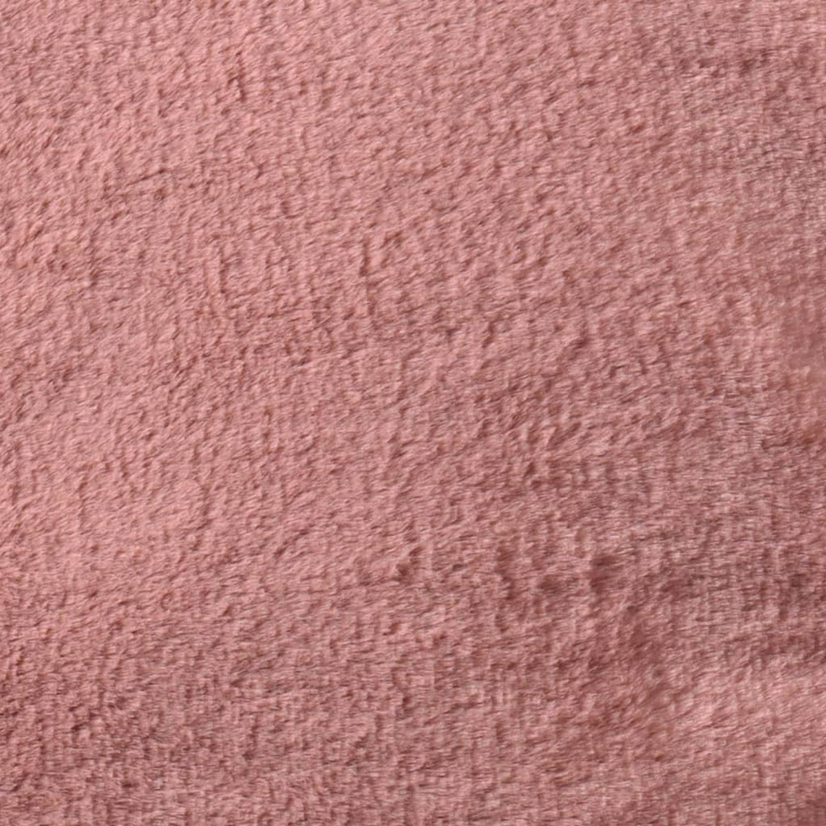 Nahaufnahme eines rosa, flauschigen Stoffes mit weicher Textur.