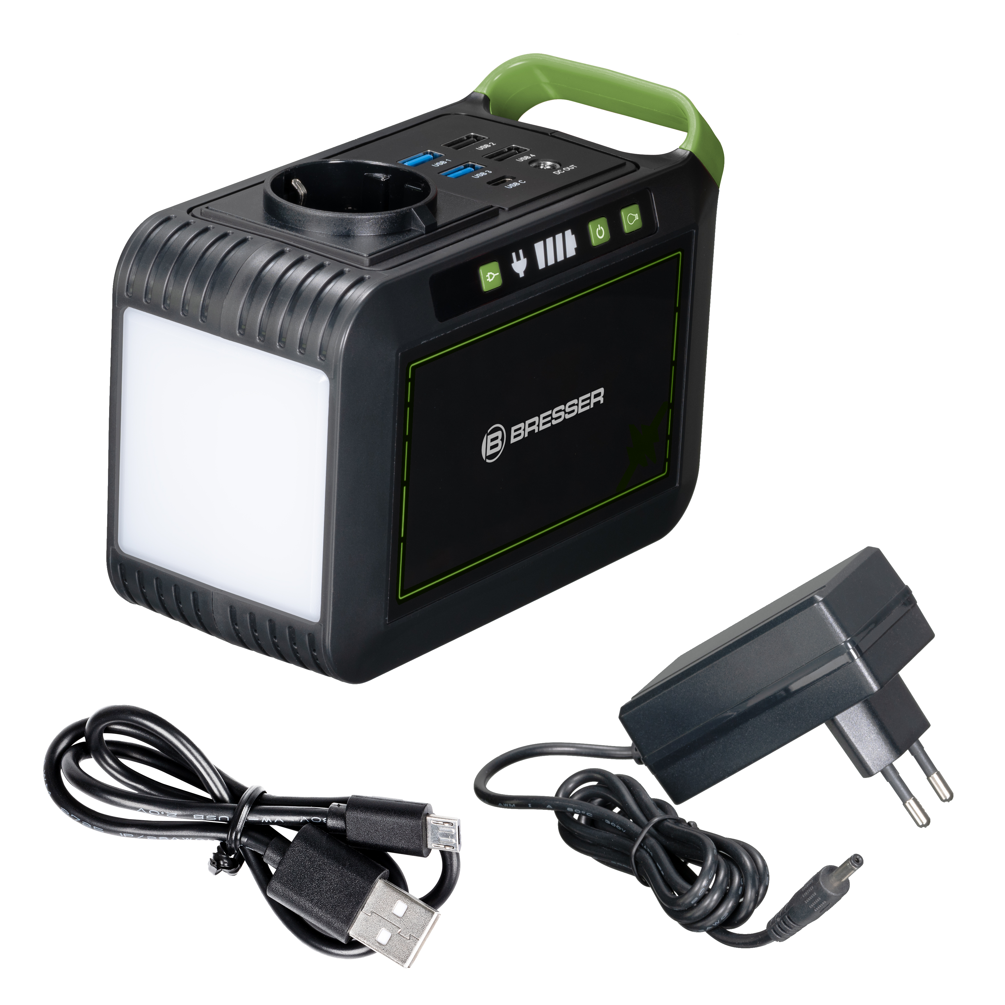 Una estación de energía portátil negra y verde con puertos USB, luz y toma de corriente, con cables y cargador.