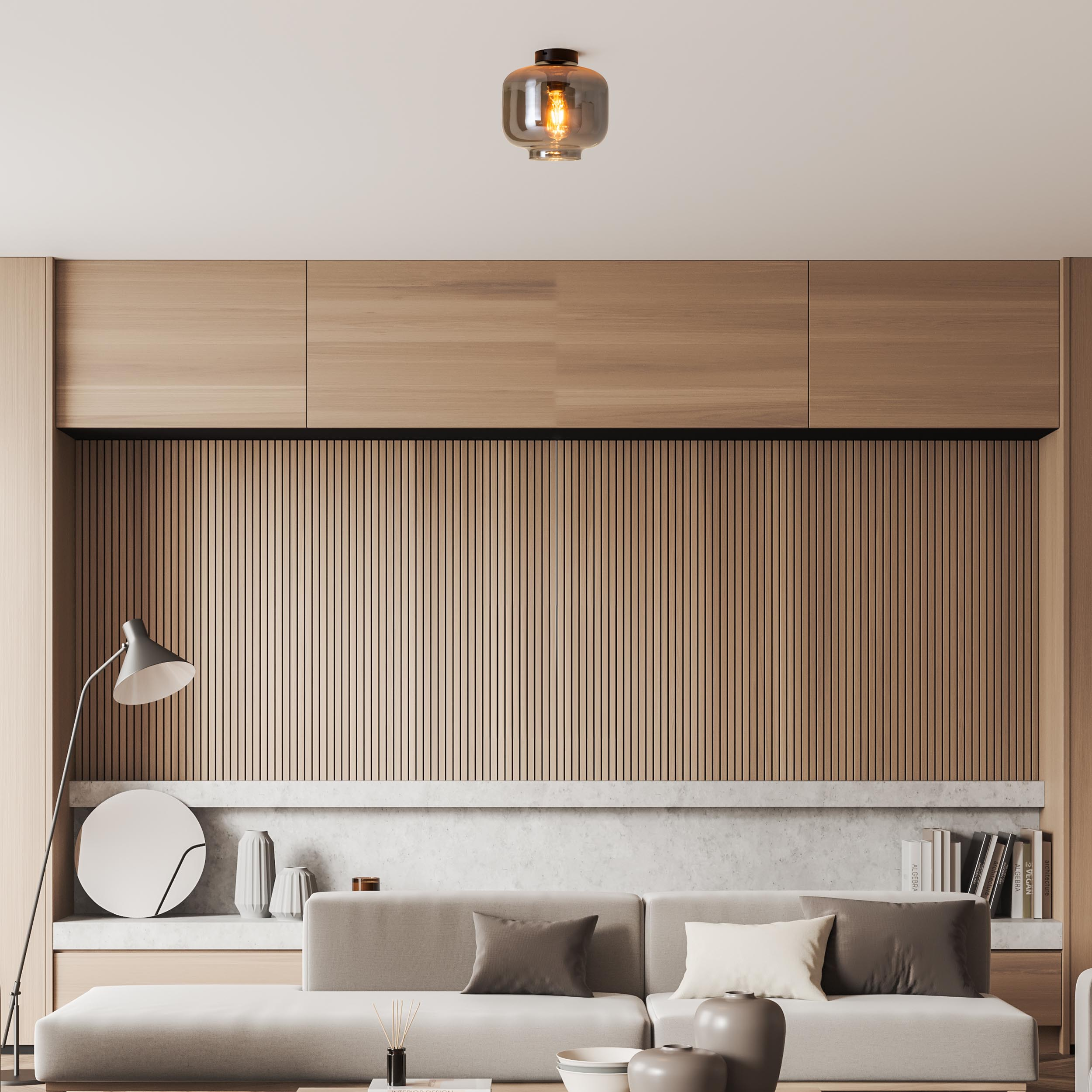 Salon moderne avec boiseries et un luminaire.