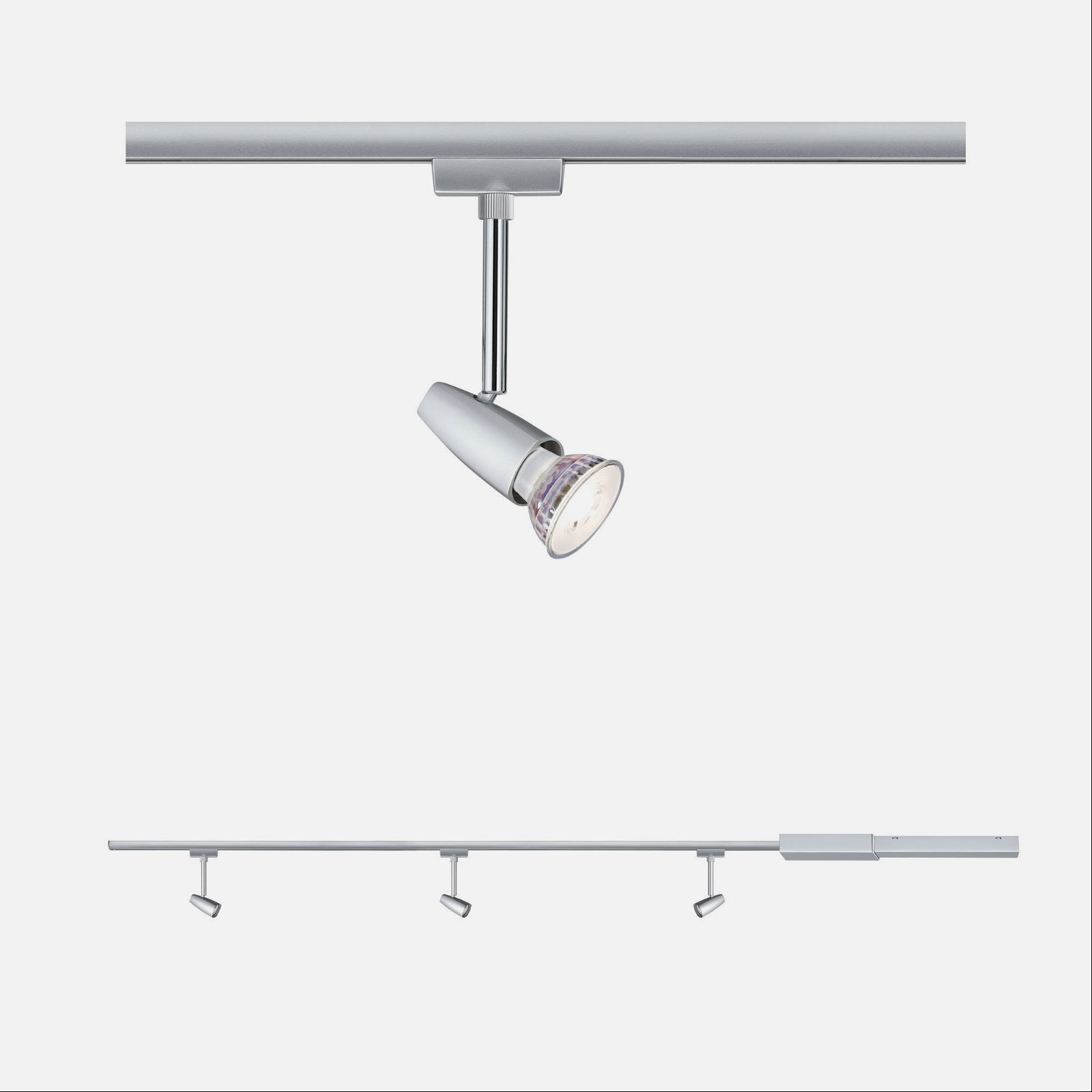 Oświetlenie szynowe z trzema reflektorami. Srebrny metal. Białe tło.