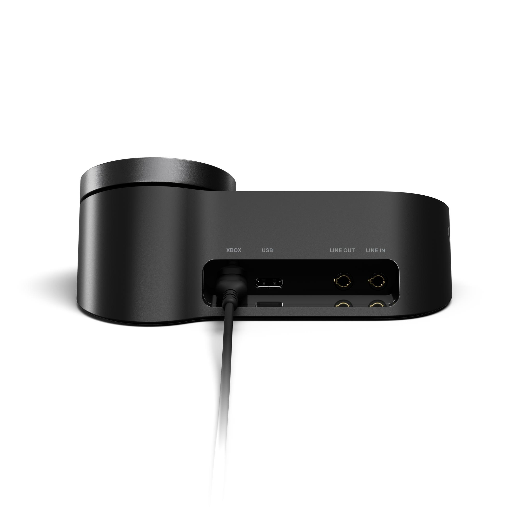 Dispositivo audio gaming nero, vista posteriore. Ingressi: USB, line in/out.