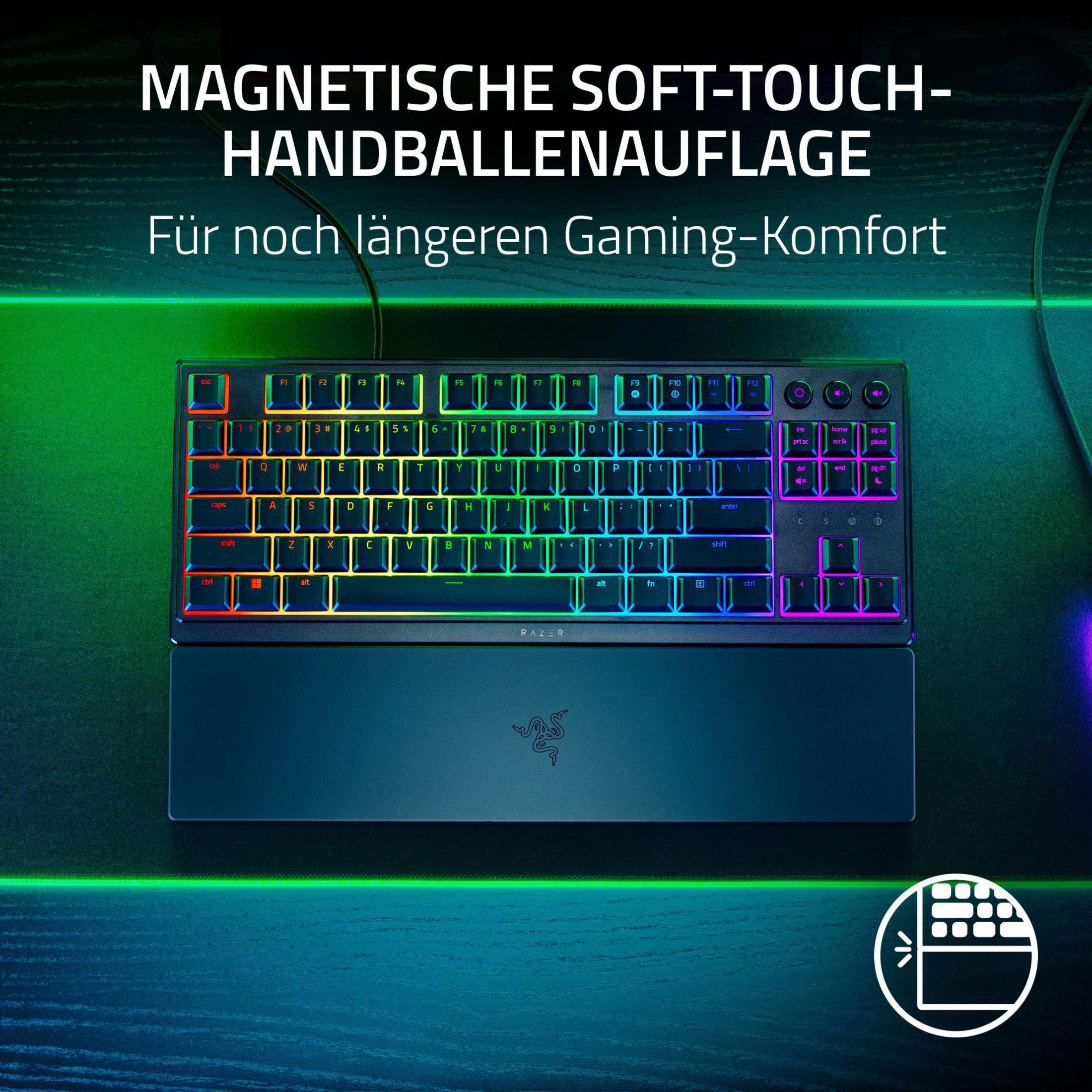 Czarna klawiatura z podświetleniem RGB i podpórką pod nadgarstki. Tekst mówi "Magnetyczny Soft-Touch Hand Ball Rest".