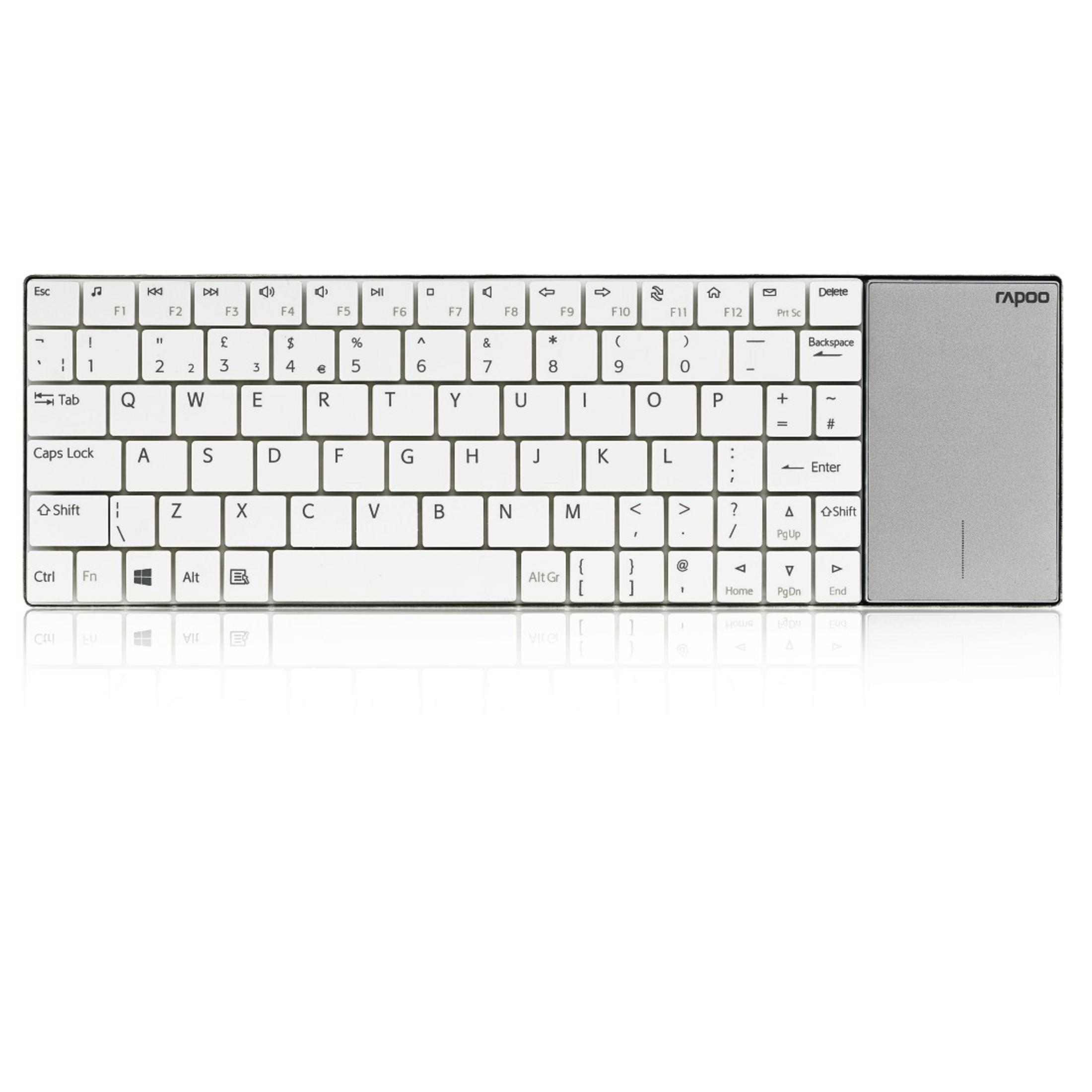 Una tastiera piccola, bianca con un touchpad sul lato destro.