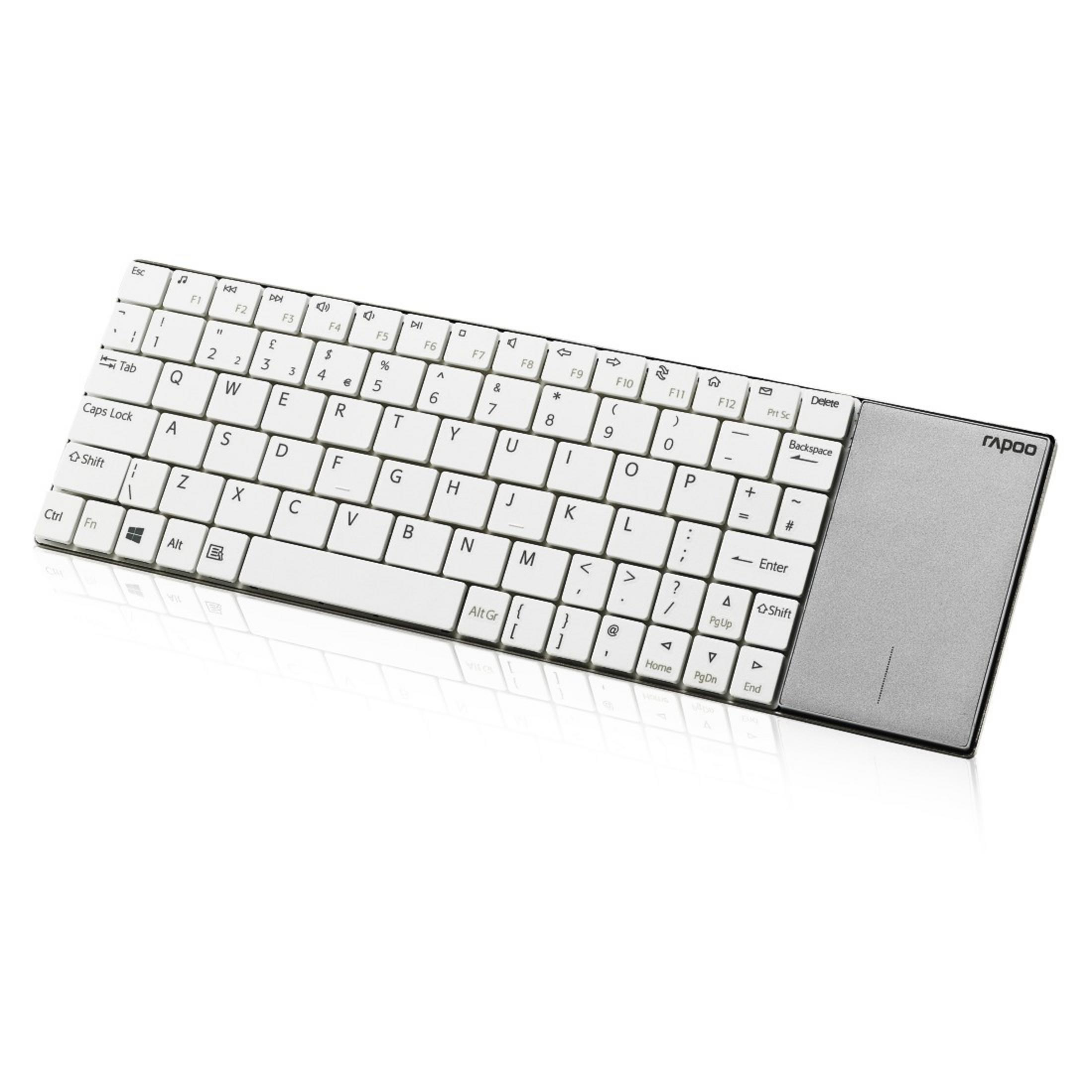 Una tastiera bianca e grigia con un touchpad.